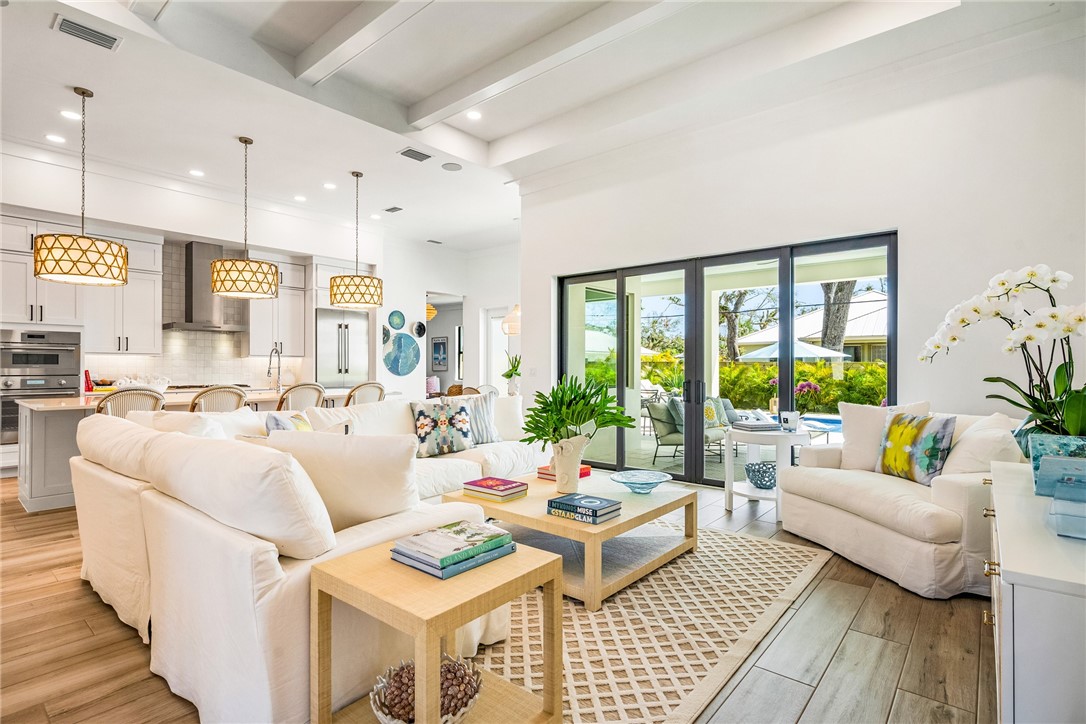 636 Cypress Road Vero Beach, FL 32963 - Photo 3 of 32 a living room with furniture and a large window