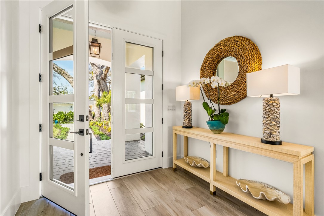 636 Cypress Road Vero Beach, FL 32963 - Photo 4 of 32 a view of living room with furniture and wooden floor