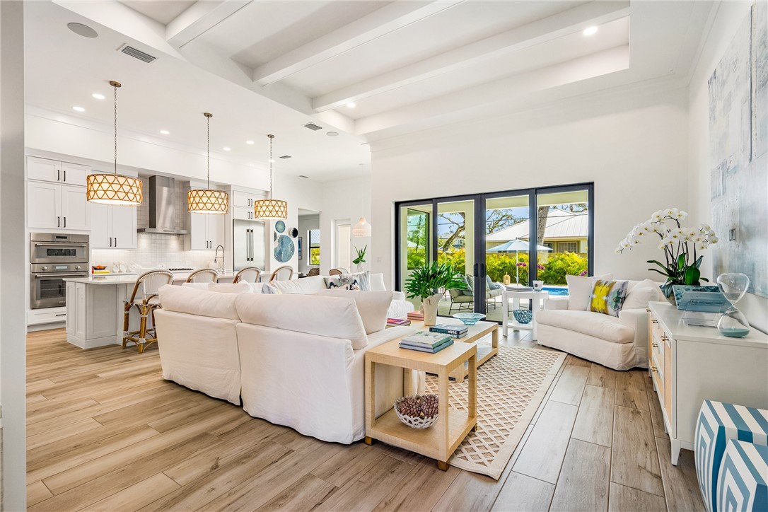 636 Cypress Road Vero Beach, FL 32963 - Photo 6 of 32 a living room with furniture and a large window