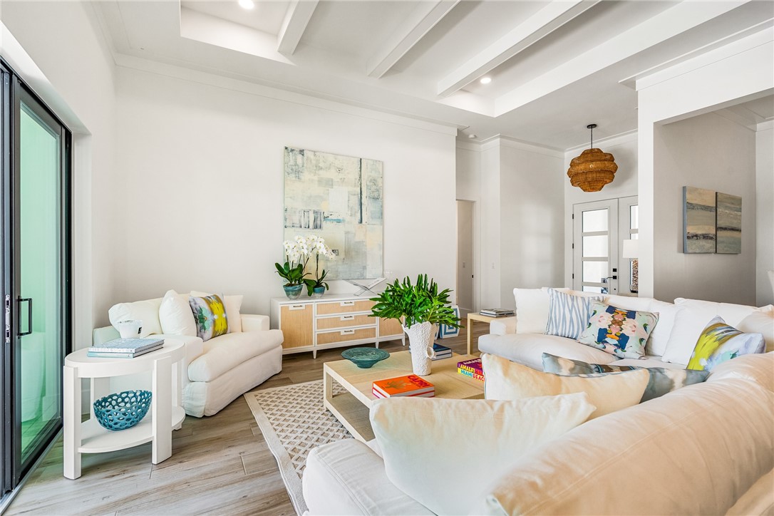 636 Cypress Road Vero Beach, FL 32963 - Photo 7 of 32 a living room with furniture and a large window