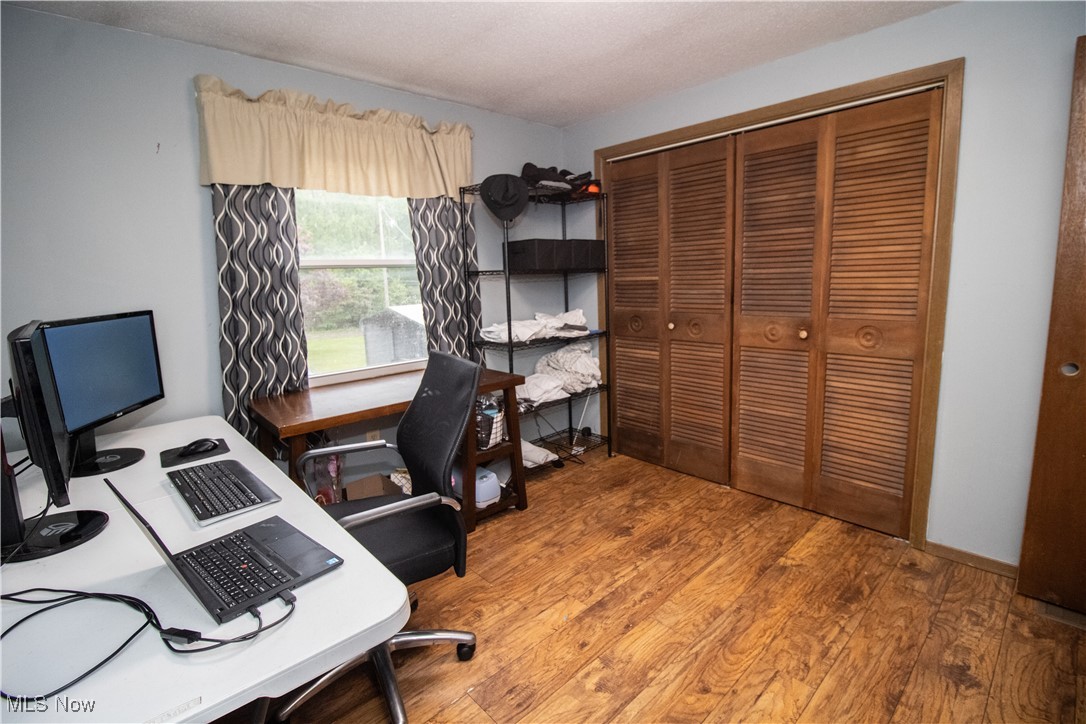 6333 Warren - Sharon Road Brookfield, OH 44403 - Photo 13 of 22 Office with light wood-style flooring and baseboards