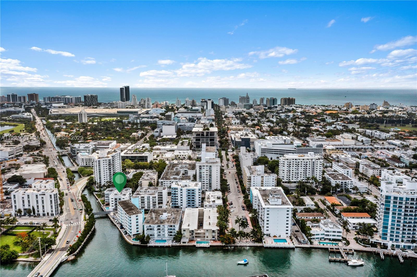 1674 Bay Road, Unit 504 Miami Beach, FL 33139 - Photo 21 of 25 an aerial view of residential building with outdoor space