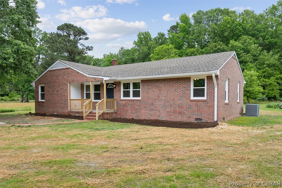 9040 Diascund Road Lanexa, VA 23089 - Photo 2 of 37 Single story home with central AC and a front lawn