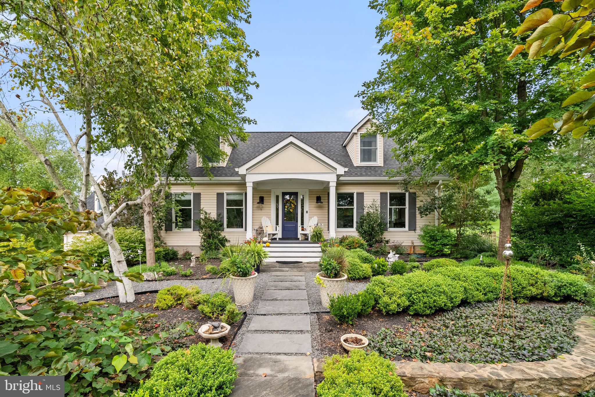 22235 Newlin Mill Road Middleburg, VA 20117 - Photo 1 of 106 a front view of a house with a yard