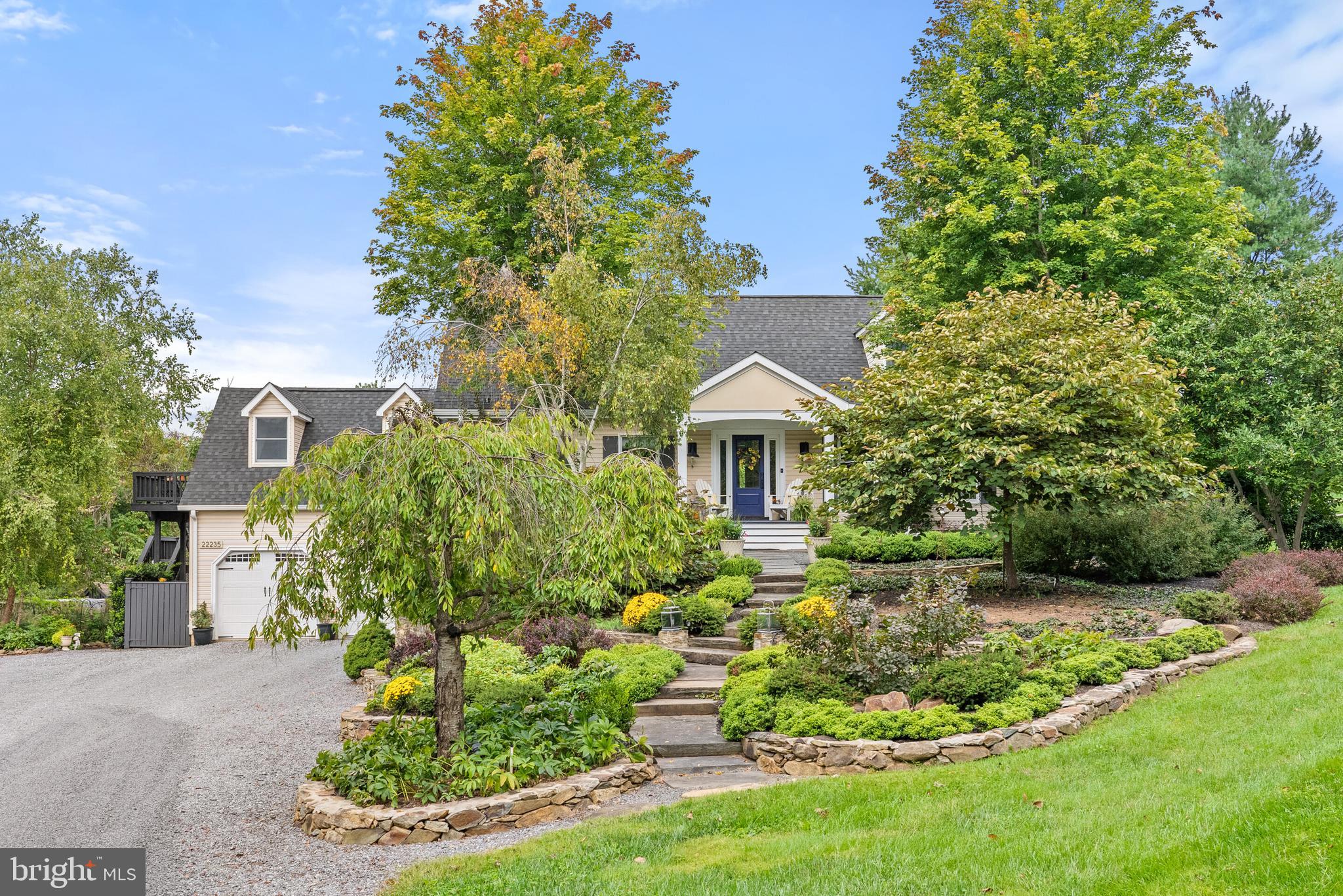 22235 Newlin Mill Road Middleburg, VA 20117 - Photo 22 of 106 a front view of a house with a yard