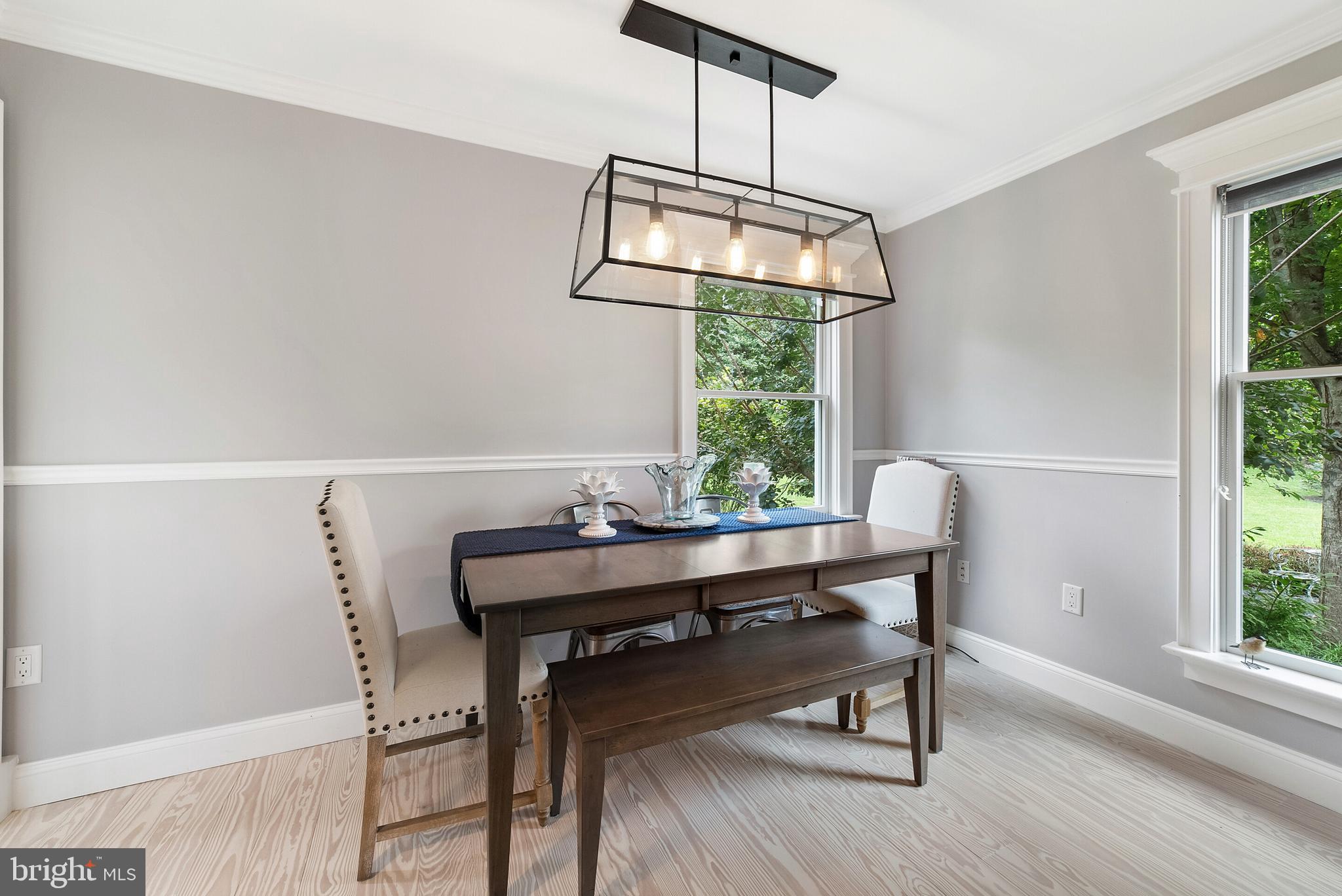 22235 Newlin Mill Road Middleburg, VA 20117 - Photo 35 of 106 a view of a dining room with furniture window and wooden floor