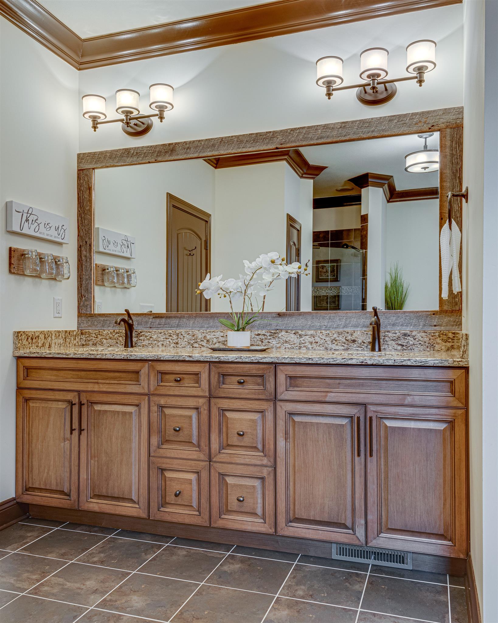 2610 Gunn Road Adams, TN 37010 - Photo 11 of 24 a bathroom with a granite countertop sink and a mirror