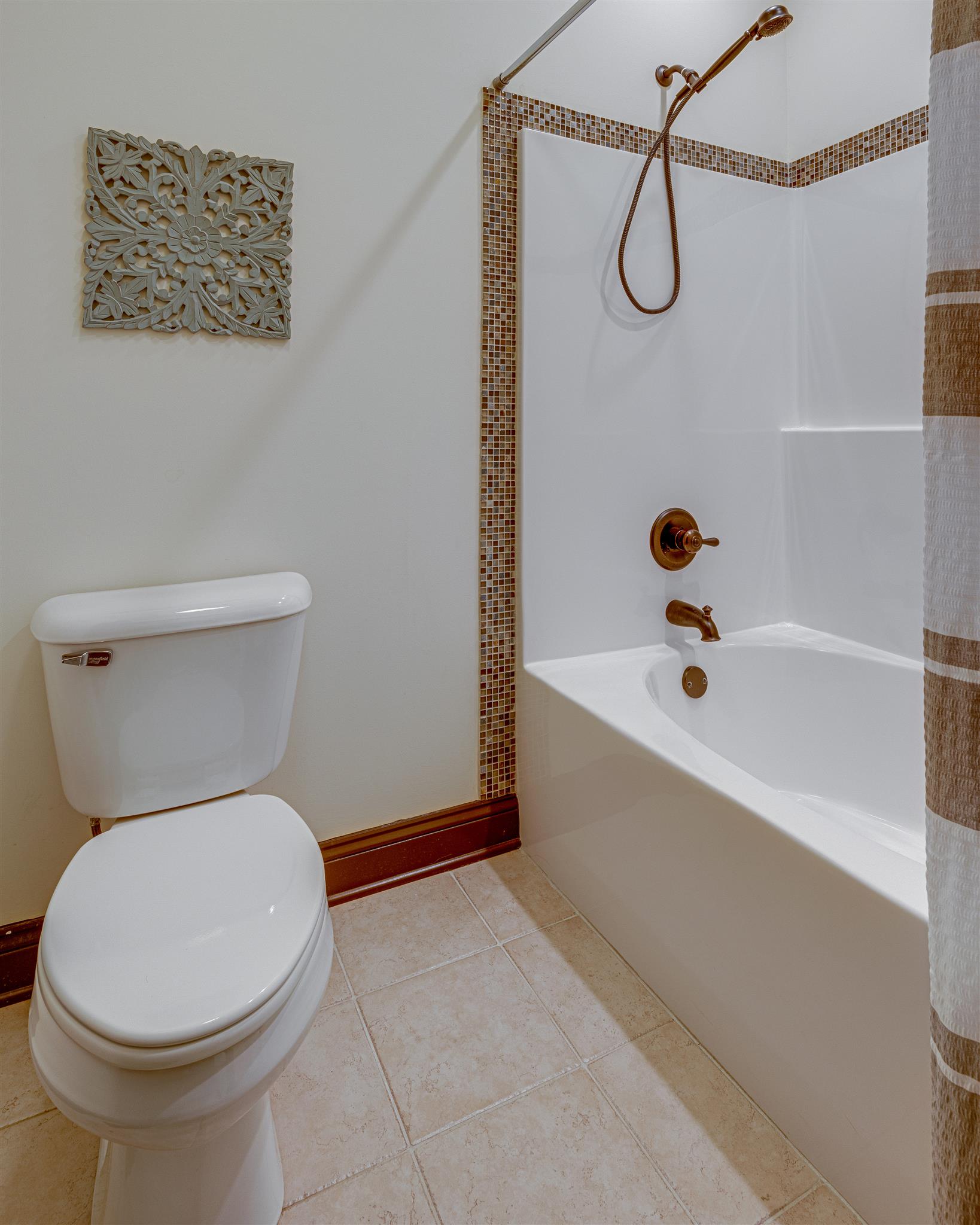 2610 Gunn Road Adams, TN 37010 - Photo 16 of 24 a bathroom with a toilet and a shower