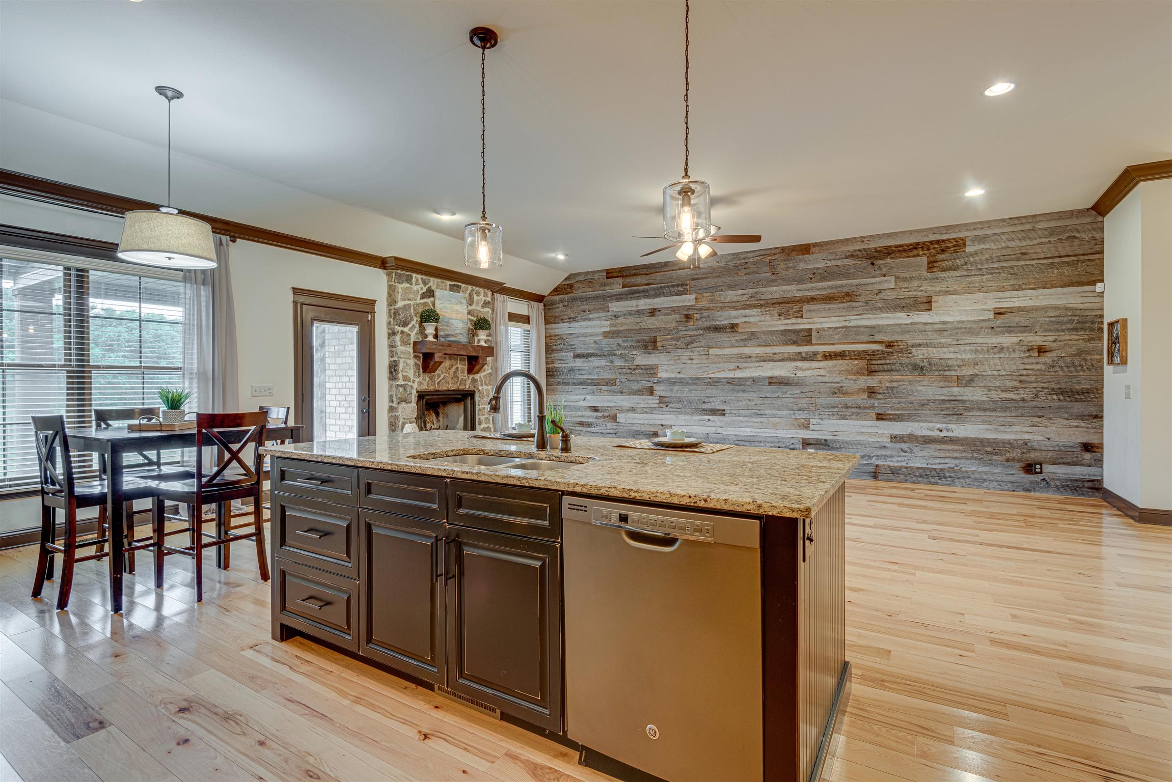 2610 Gunn Road Adams, TN 37010 - Photo 24 of 24 a kitchen with a table chairs and wooden floor