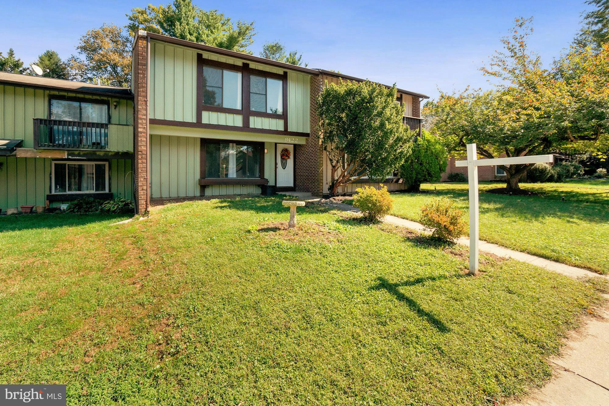 9122 Centerway Road Gaithersburg, MD 20879 - Photo 3 of 33 a view of a house with swimming pool