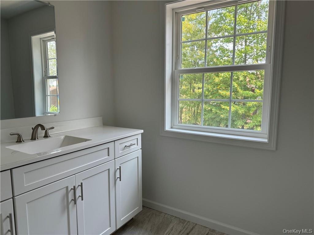 16 Pinto Road Middletown, NY 10941 - Photo 23 of 36 Bathroom with a wealth of natural light and vanity