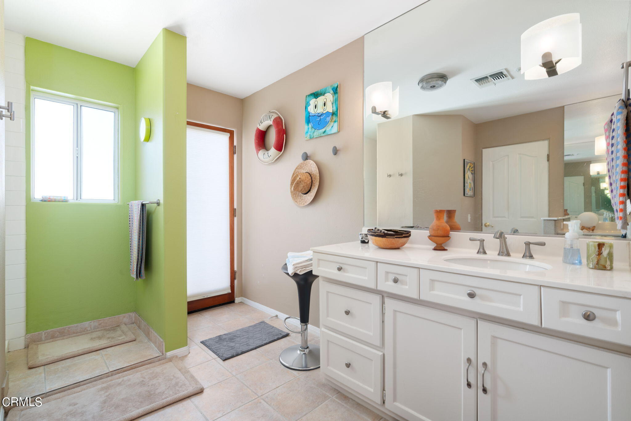 2249 Rim Road Palm Springs, CA 92264 - Photo 21 of 41 a spacious bathroom with a double vanity sink and a mirror