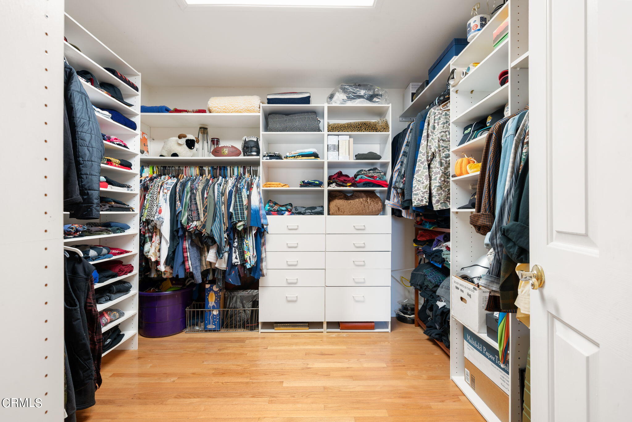 2249 Rim Road Palm Springs, CA 92264 - Photo 22 of 41 a view of walk in closet with clothes and shoes