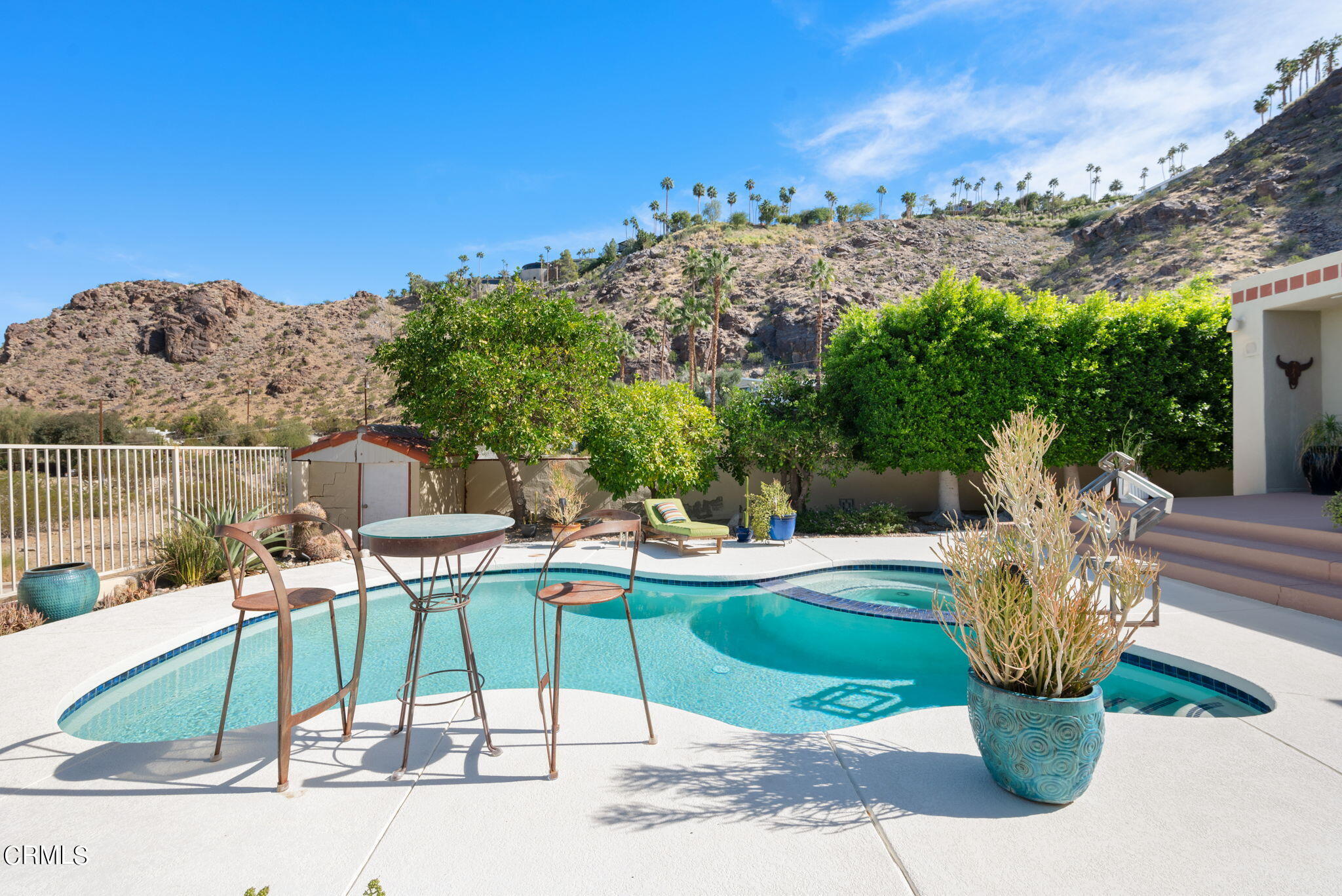2249 Rim Road Palm Springs, CA 92264 - Photo 34 of 41 a view of a backyard with sitting area