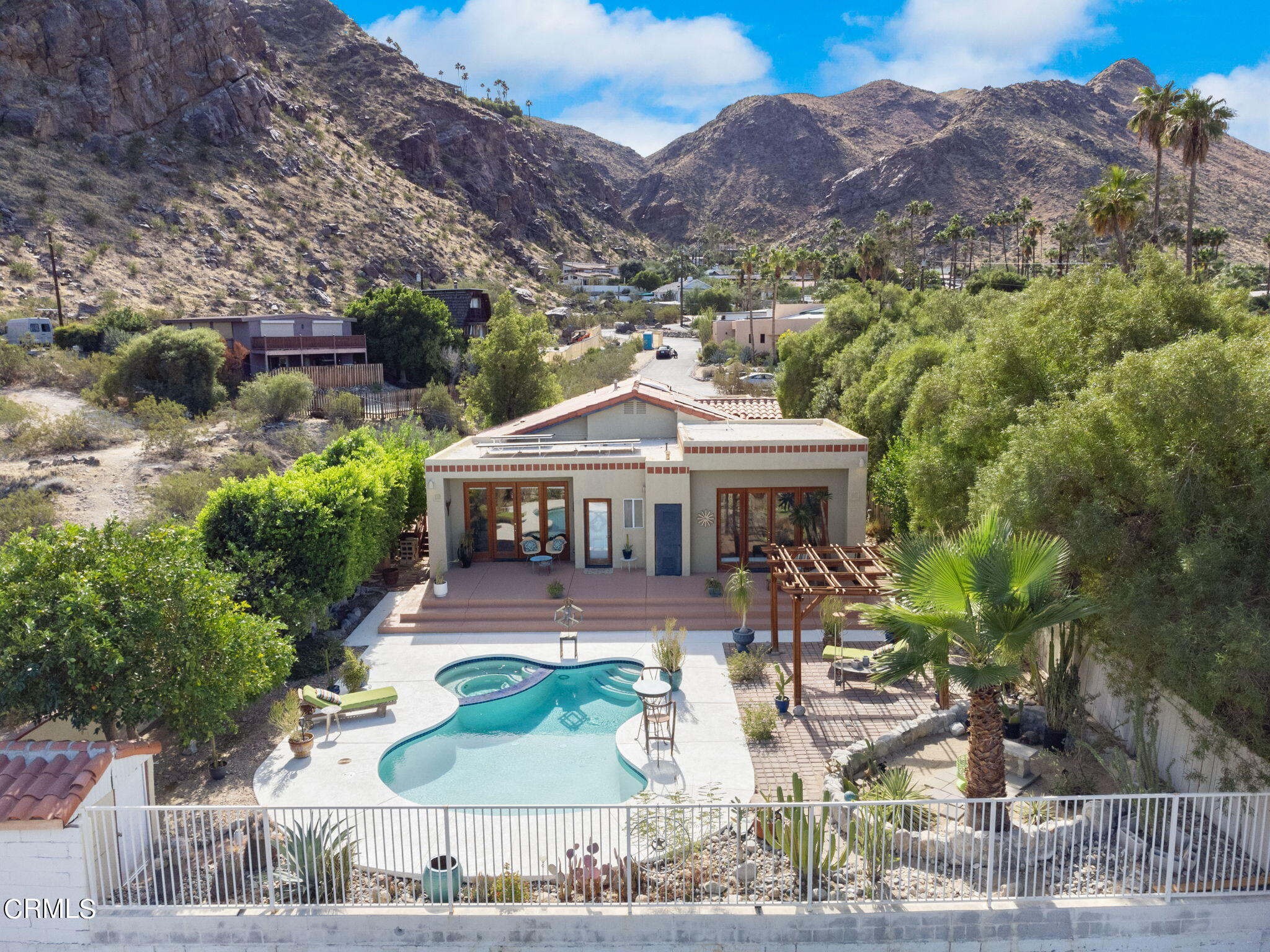 2249 Rim Road Palm Springs, CA 92264 - Photo 35 of 41 a front view of a house with a yard