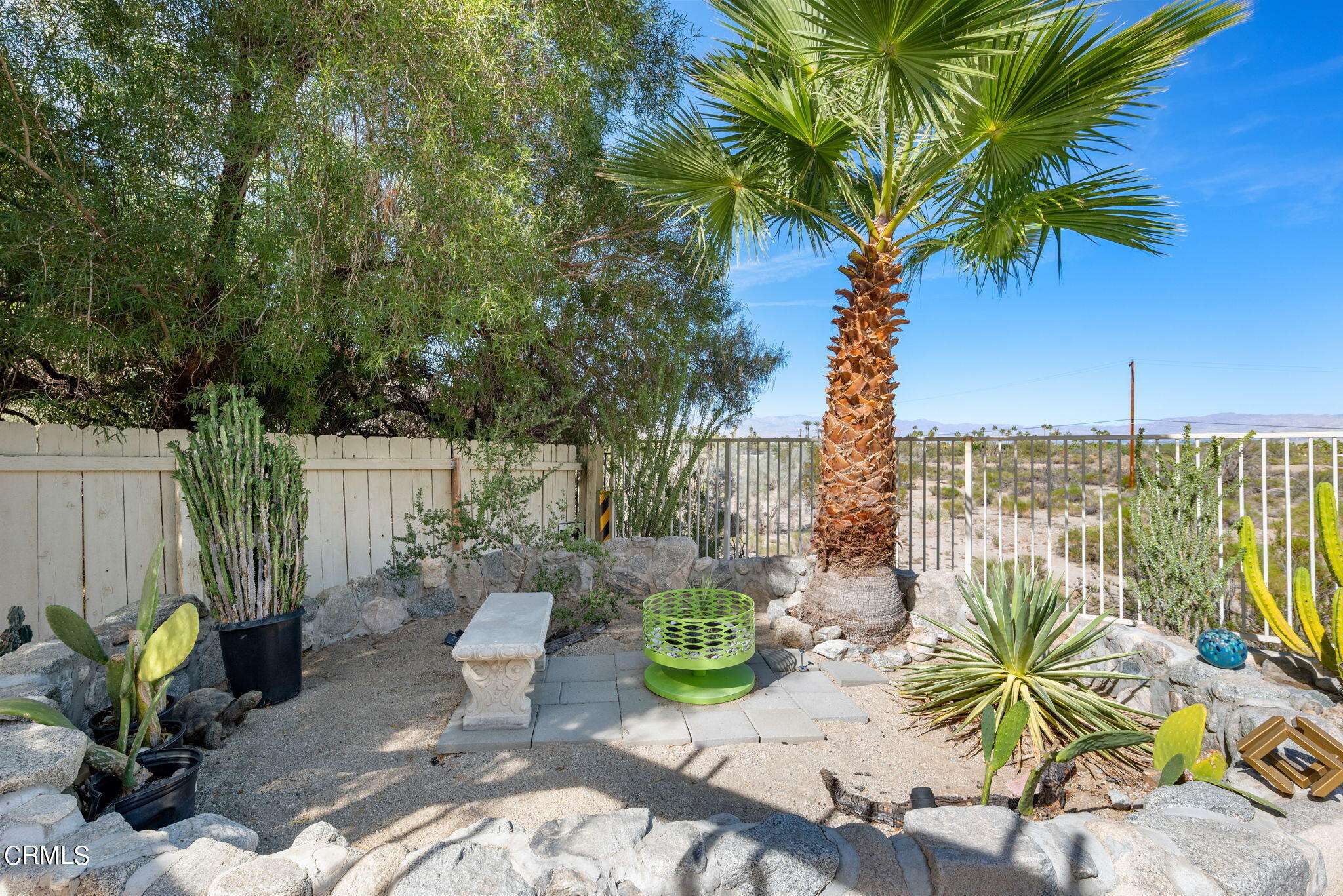 2249 Rim Road Palm Springs, CA 92264 - Photo 37 of 41 a view of a table and chairs in patio
