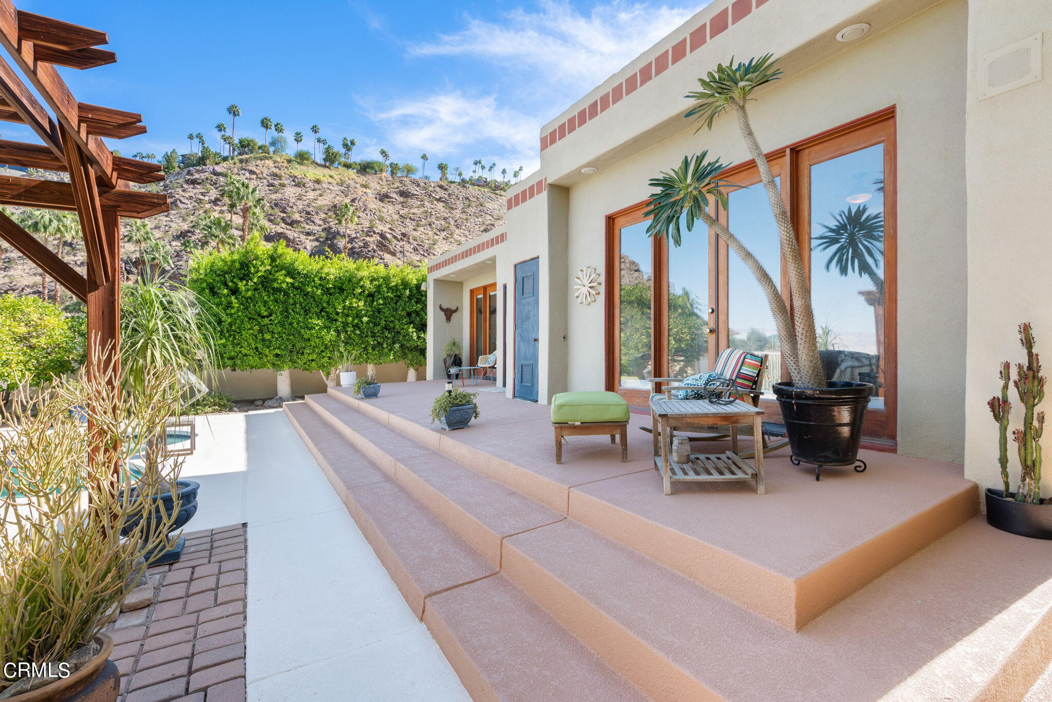 2249 Rim Road Palm Springs, CA 92264 - Photo 39 of 41 a building outdoor space with seating space