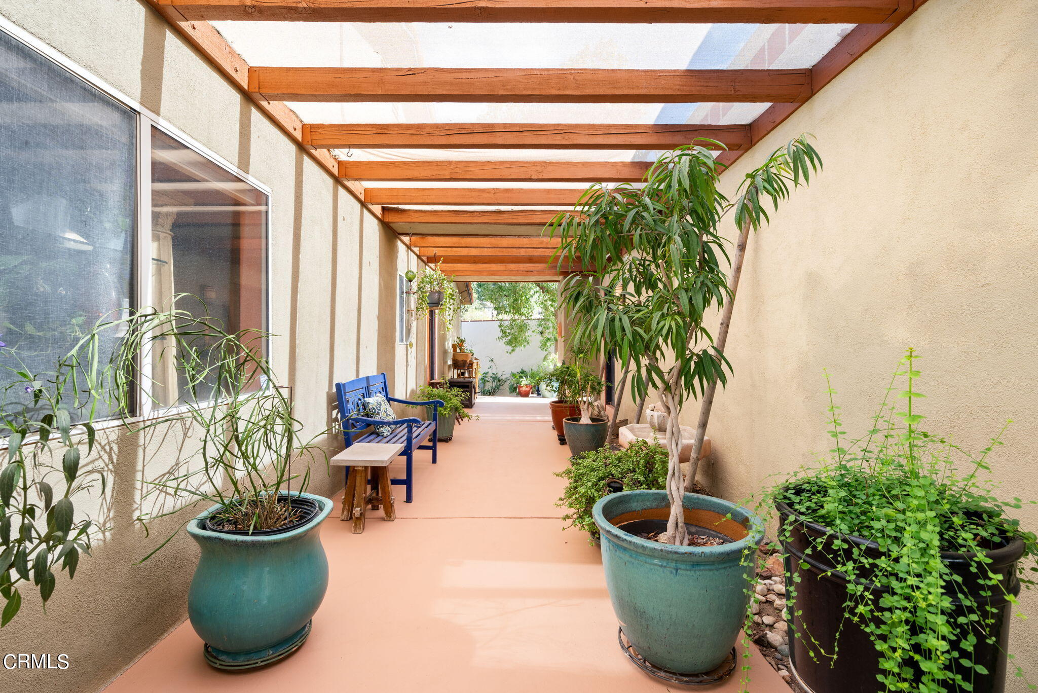 2249 Rim Road Palm Springs, CA 92264 - Photo 8 of 41 a view of a path along with potted plants