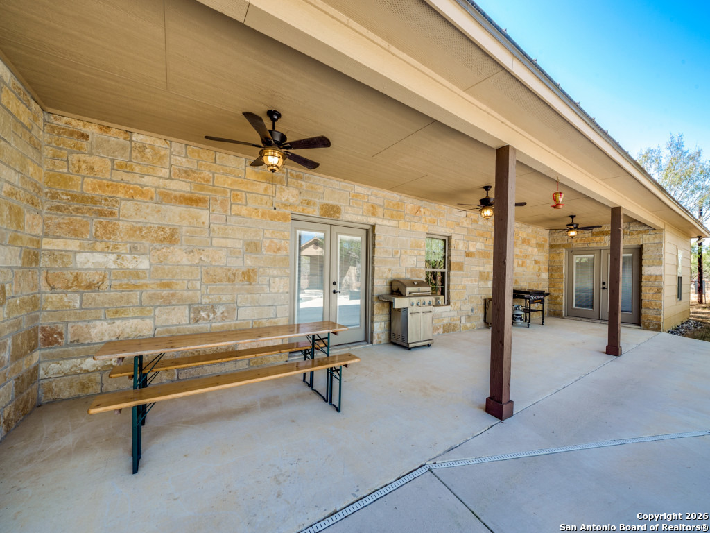 6472 Bluntzer Road Jourdanton, TX 78026 - Photo 16 of 45 a view of an outdoor seating area