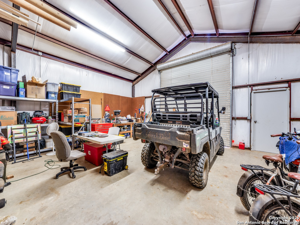 6472 Bluntzer Road Jourdanton, TX 78026 - Photo 25 of 45 a view of a storage room with lots of stuff