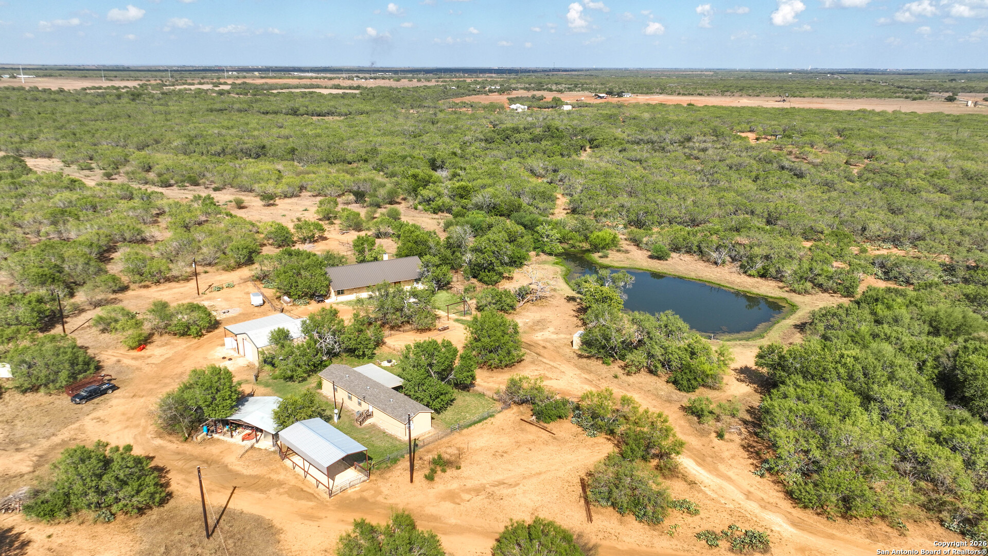 6472 Bluntzer Road Jourdanton, TX 78026 - Photo 36 of 45 a view of lake and mountain