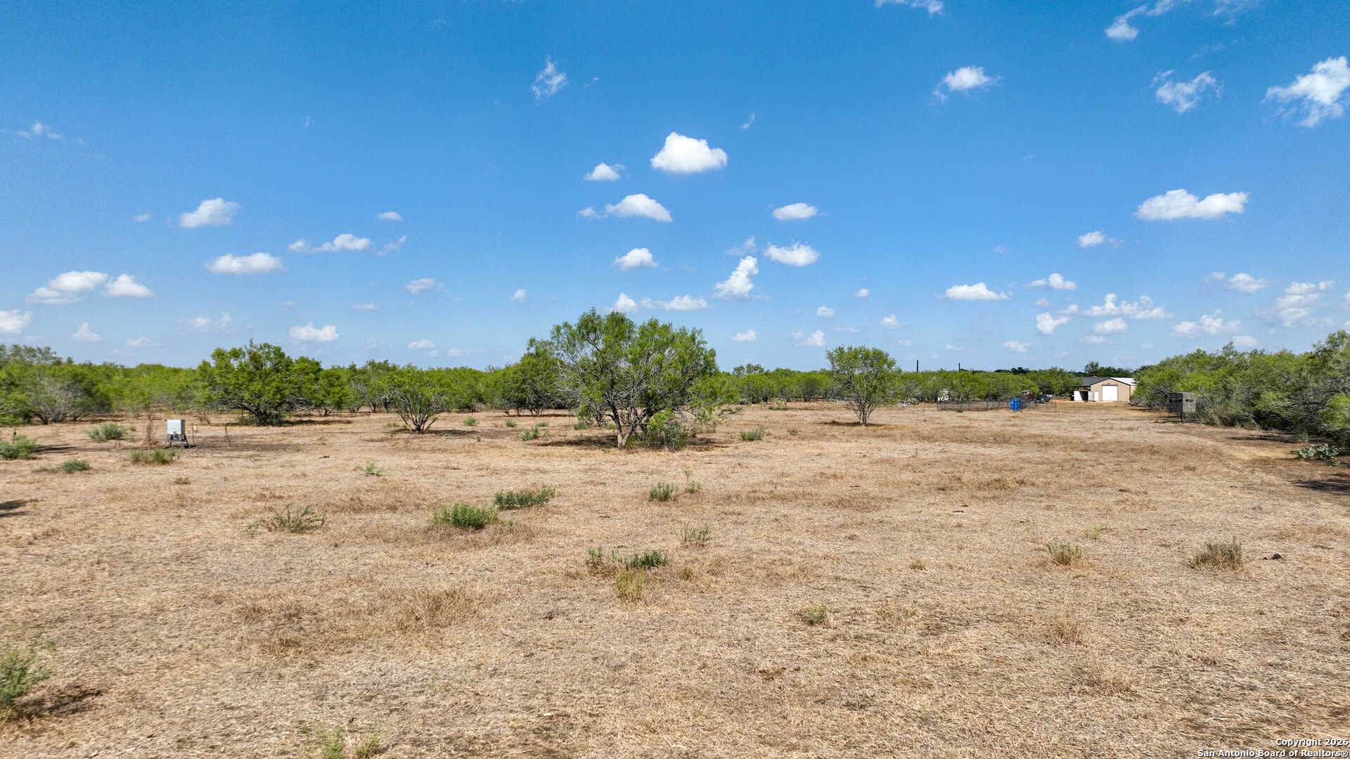 6472 Bluntzer Road Jourdanton, TX 78026 - Photo 44 of 45 a view of an outdoor space and yard