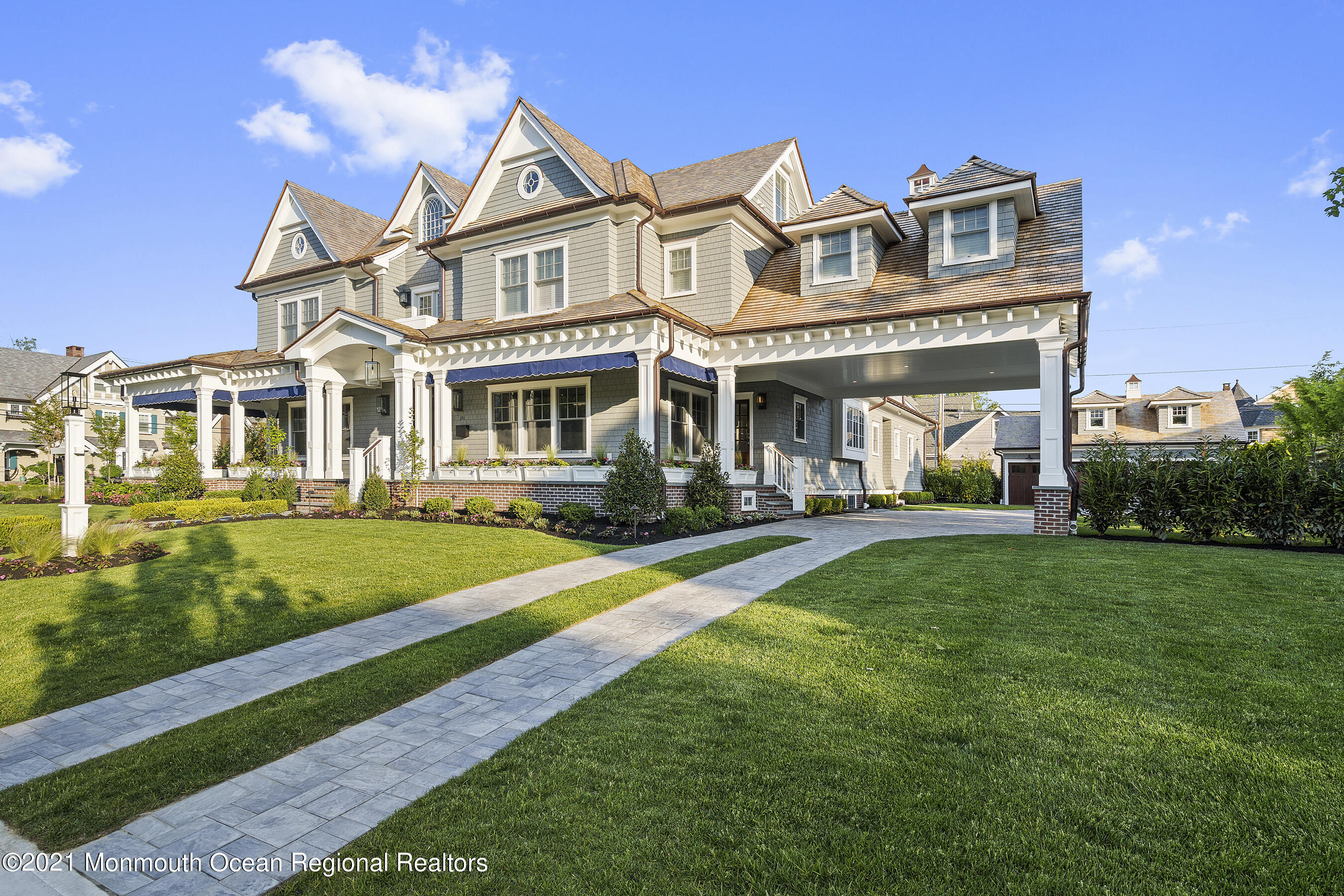 101 Ludlow Avenue Spring Lake, NJ 07762 - Photo 11 of 162 a front view of a house with a yard