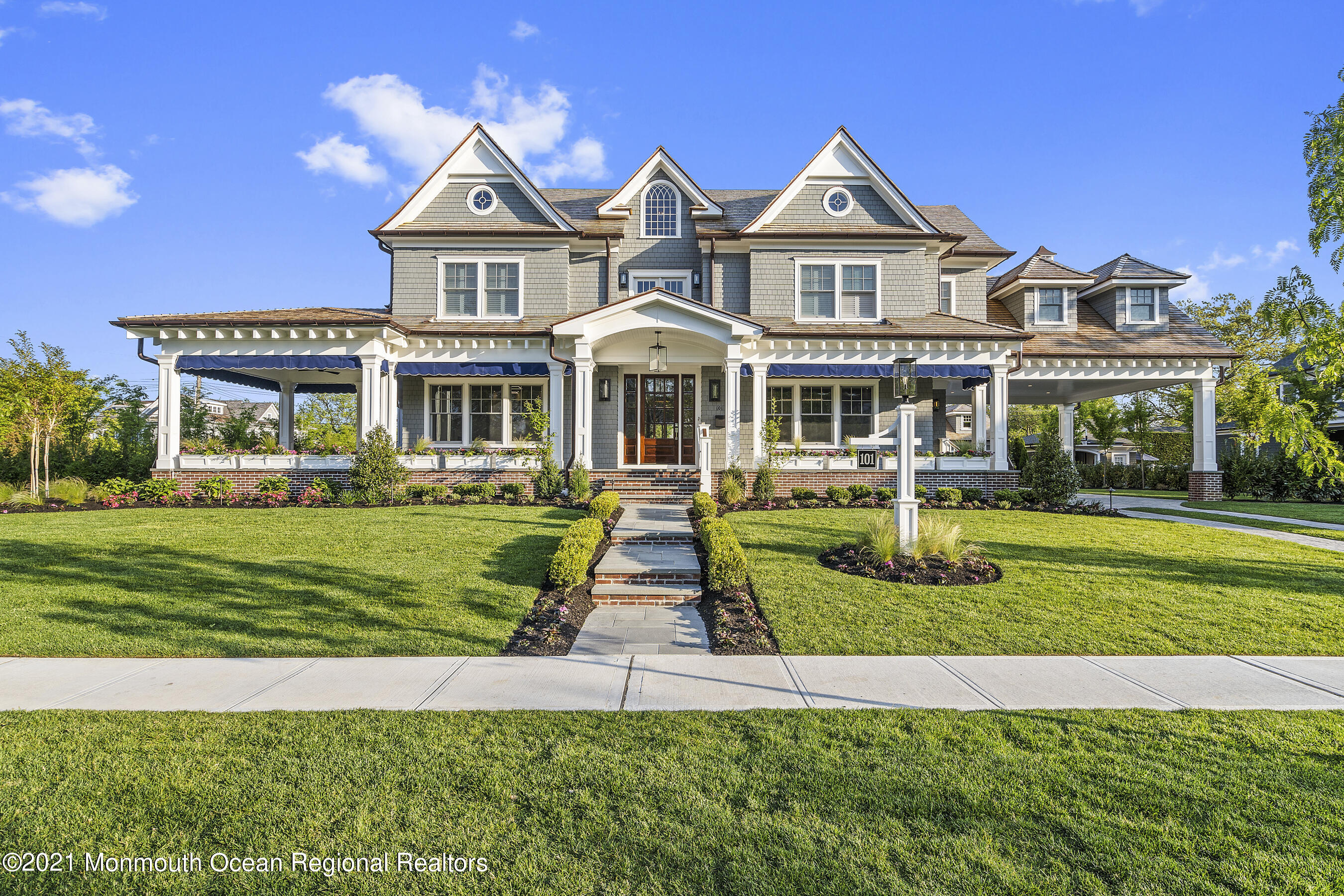 101 Ludlow Avenue Spring Lake, NJ 07762 - Photo 13 of 162 a front view of a house with a yard