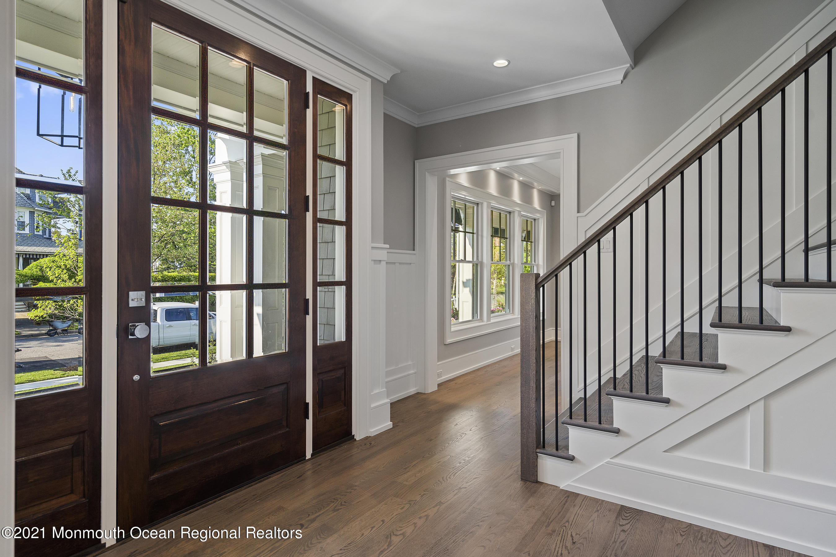 101 Ludlow Avenue Spring Lake, NJ 07762 - Photo 18 of 162 a view of entryway with stairs and wooden floor