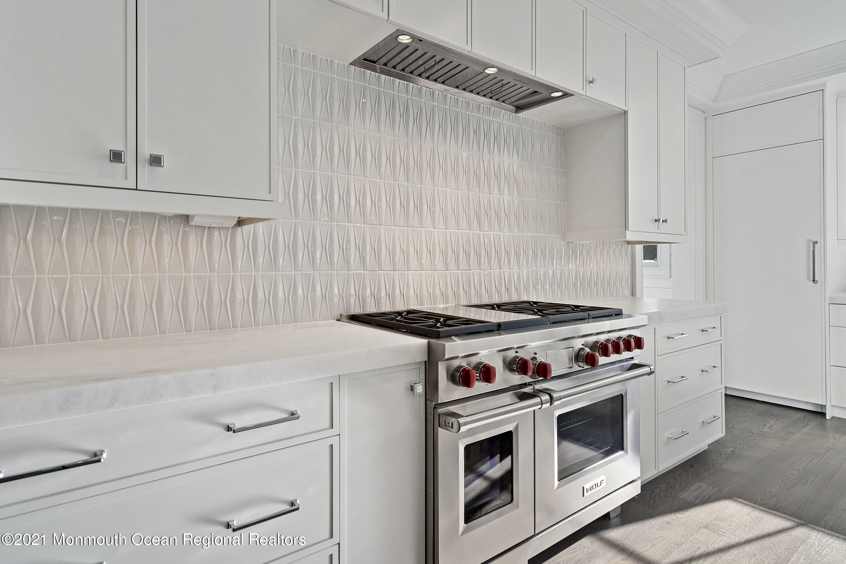 101 Ludlow Avenue Spring Lake, NJ 07762 - Photo 36 of 162 a white stove top oven sitting inside of a kitchen