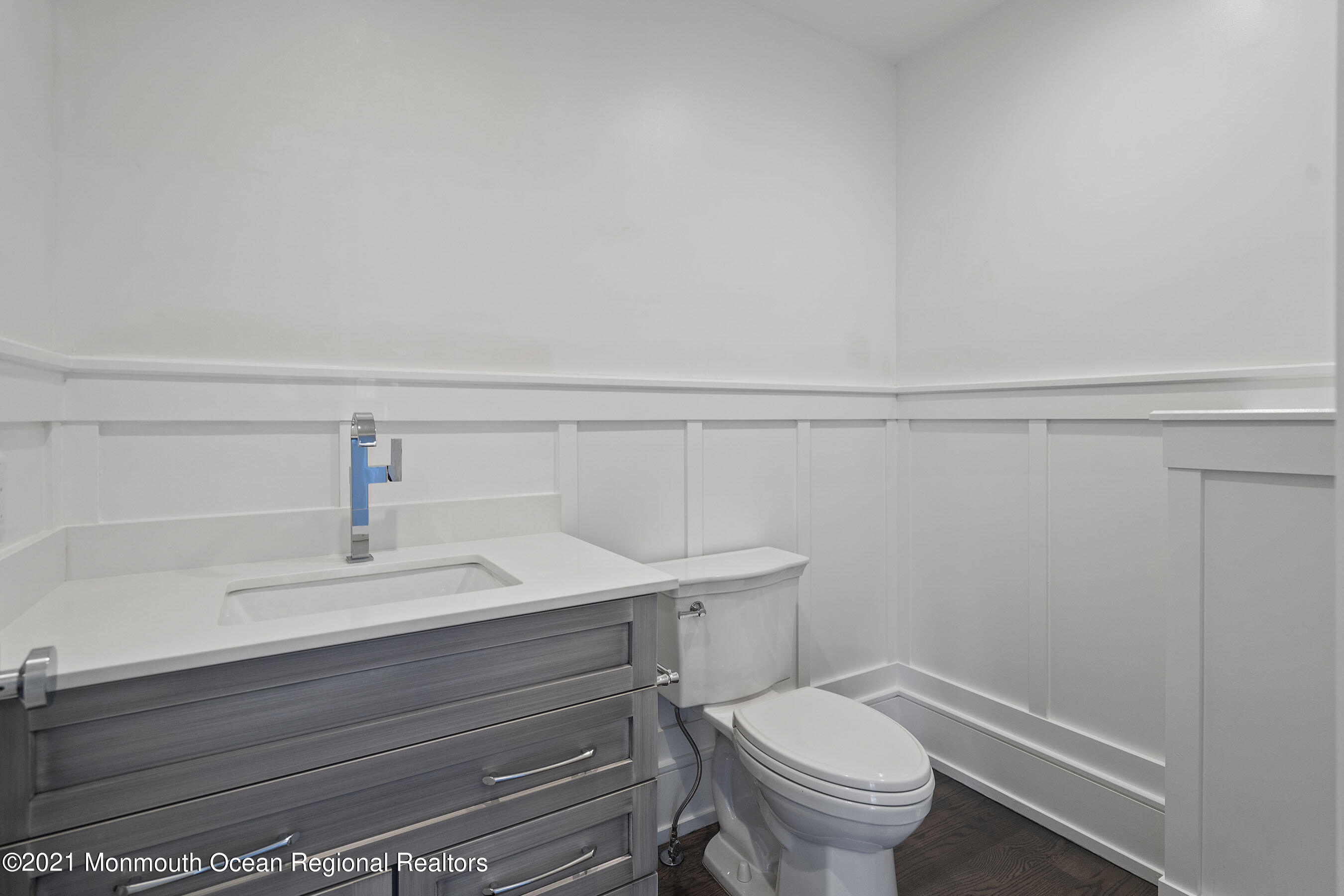 101 Ludlow Avenue Spring Lake, NJ 07762 - Photo 63 of 162 a bathroom with a toilet a sink and vanity