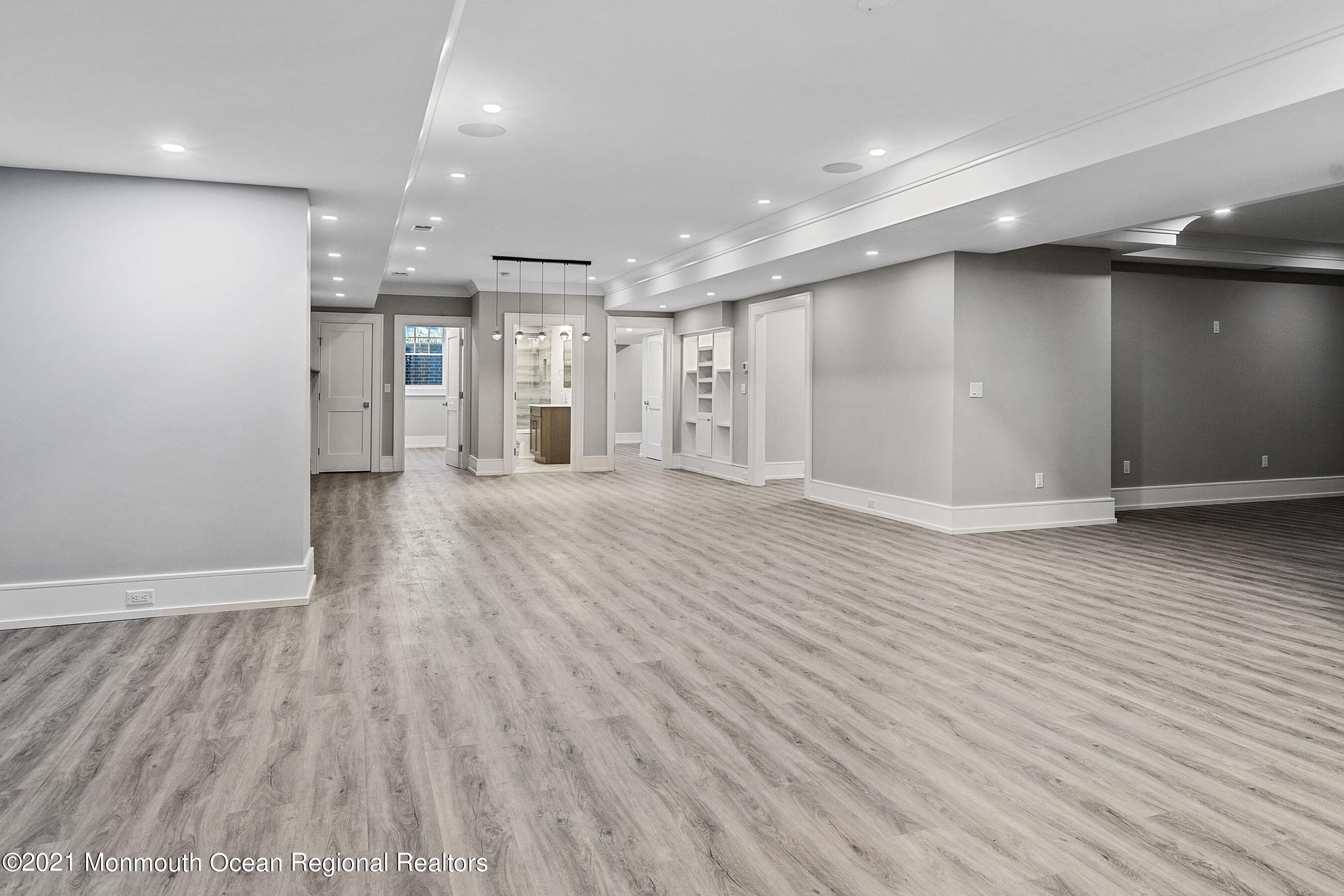 101 Ludlow Avenue Spring Lake, NJ 07762 - Photo 71 of 162 a view of an empty room with wooden floor