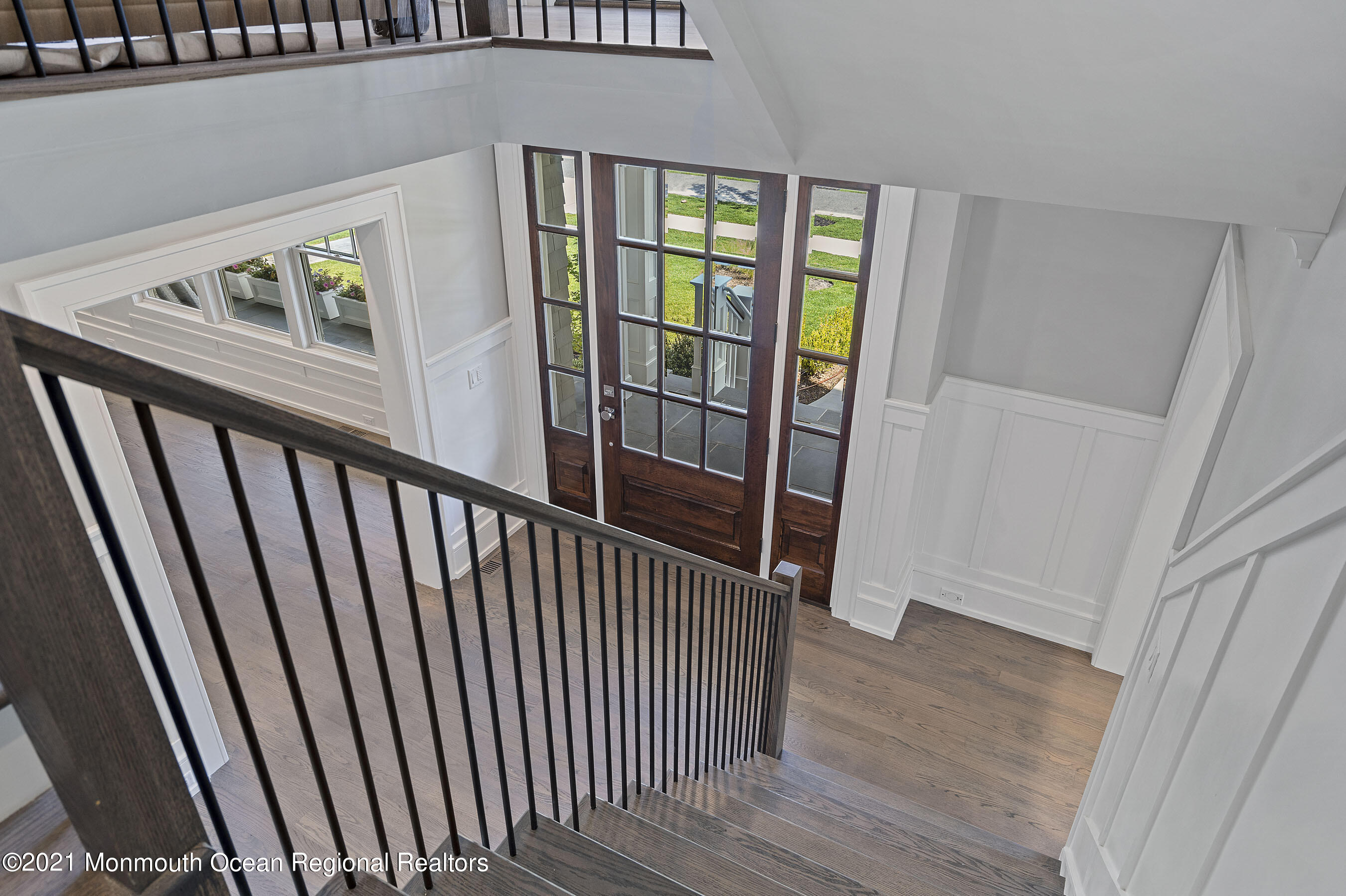 101 Ludlow Avenue Spring Lake, NJ 07762 - Photo 77 of 162 a view of a hallway with wooden floor and stairs