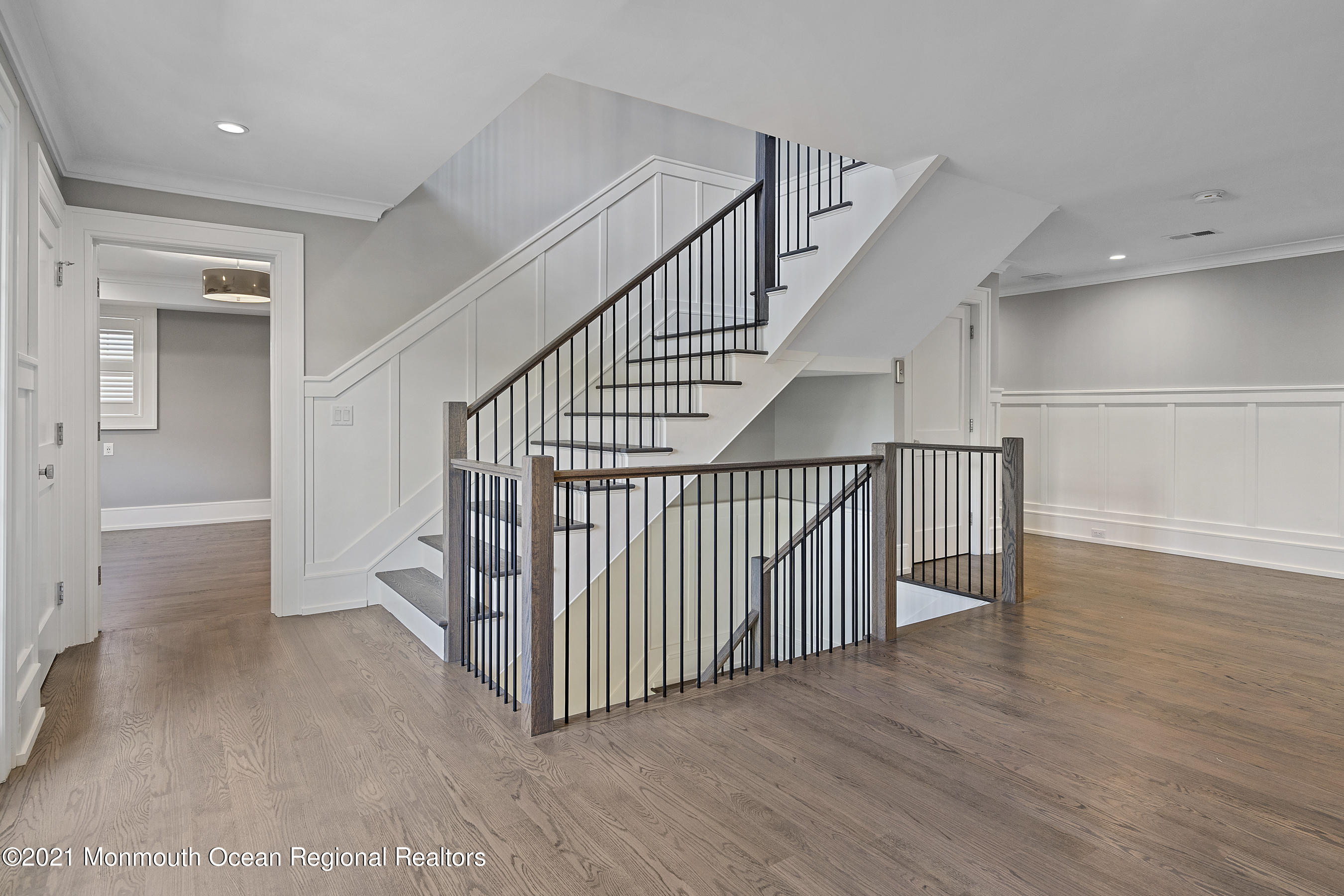 101 Ludlow Avenue Spring Lake, NJ 07762 - Photo 78 of 162 a view of a hallway with wooden floor and entryway