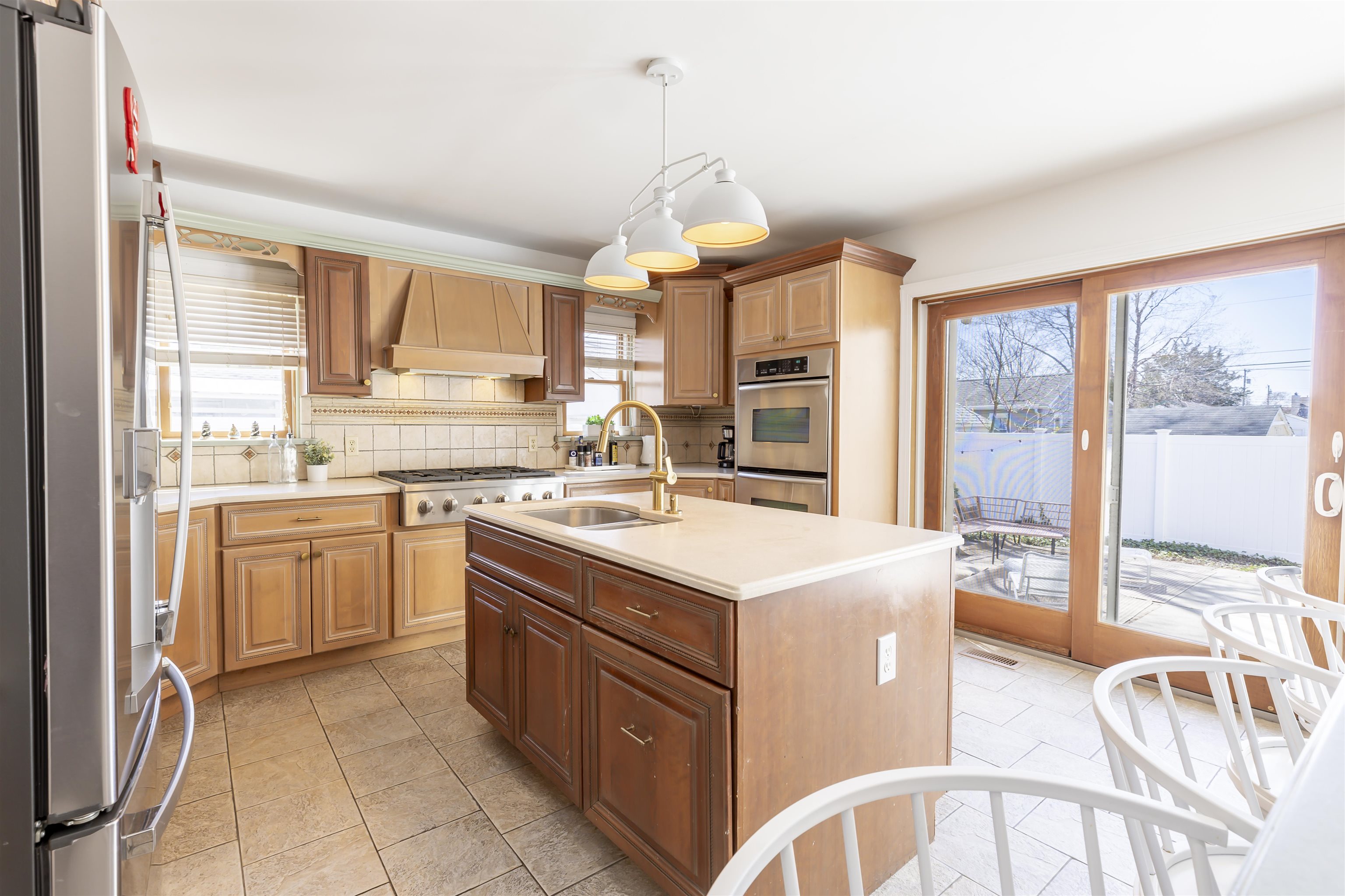 50 Birch Road Villas, NJ 08251 - Photo 14 of 50 a kitchen that has a lot of white cabinets and wooden floor