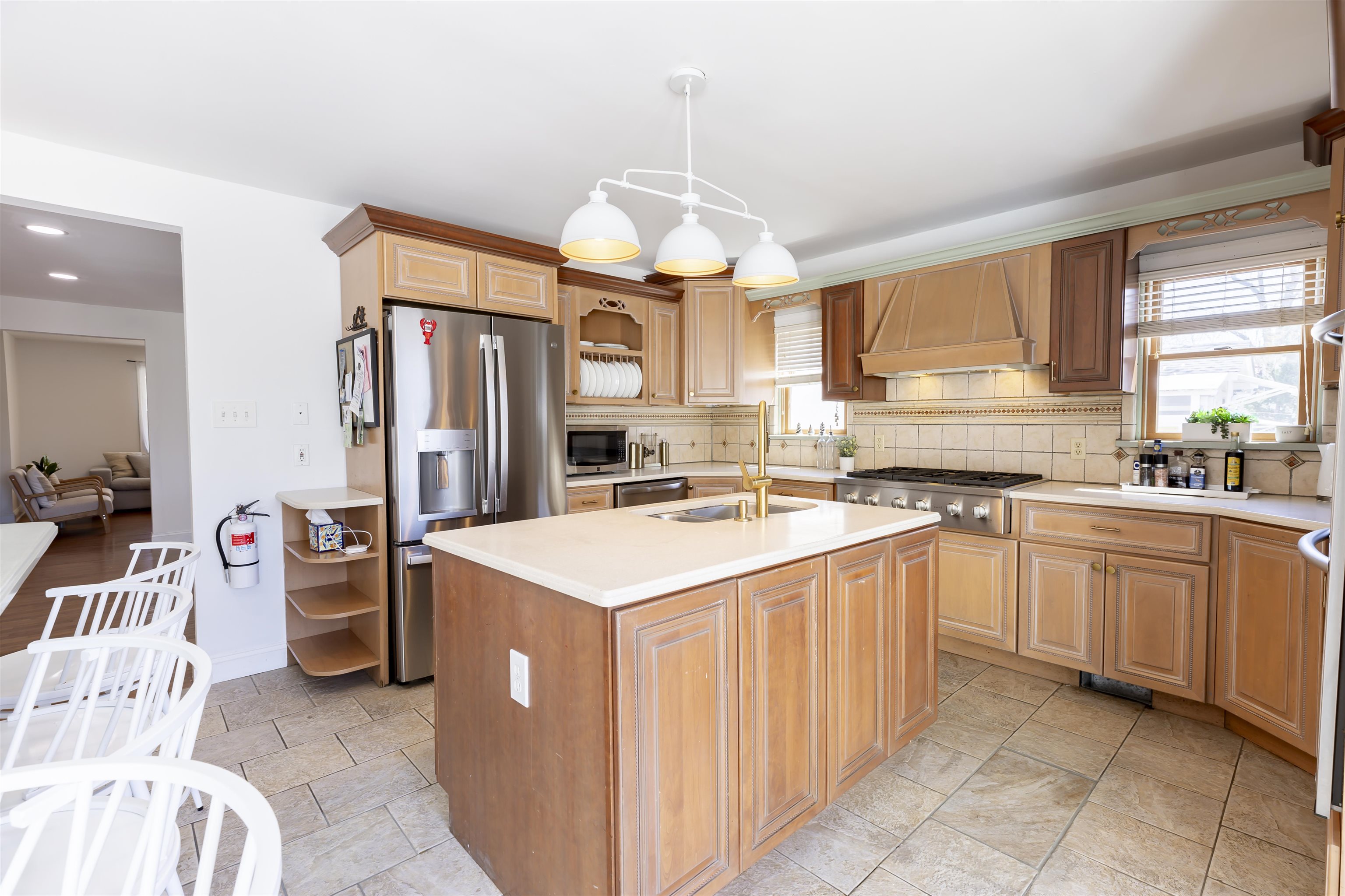 50 Birch Road Villas, NJ 08251 - Photo 17 of 50 a kitchen that has a lot of white cabinets and stainless steel appliances