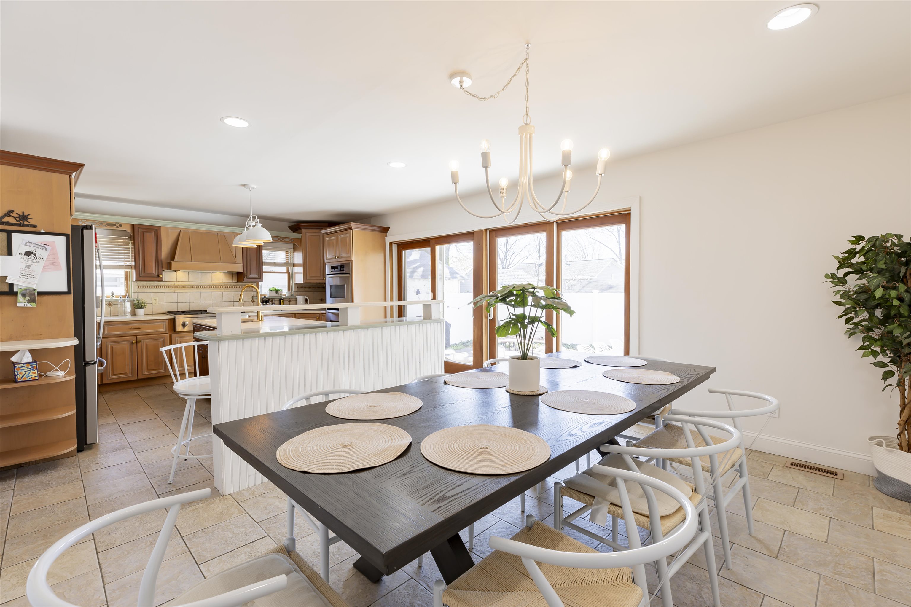 50 Birch Road Villas, NJ 08251 - Photo 18 of 50 a view of a dining room with furniture and a potted plant