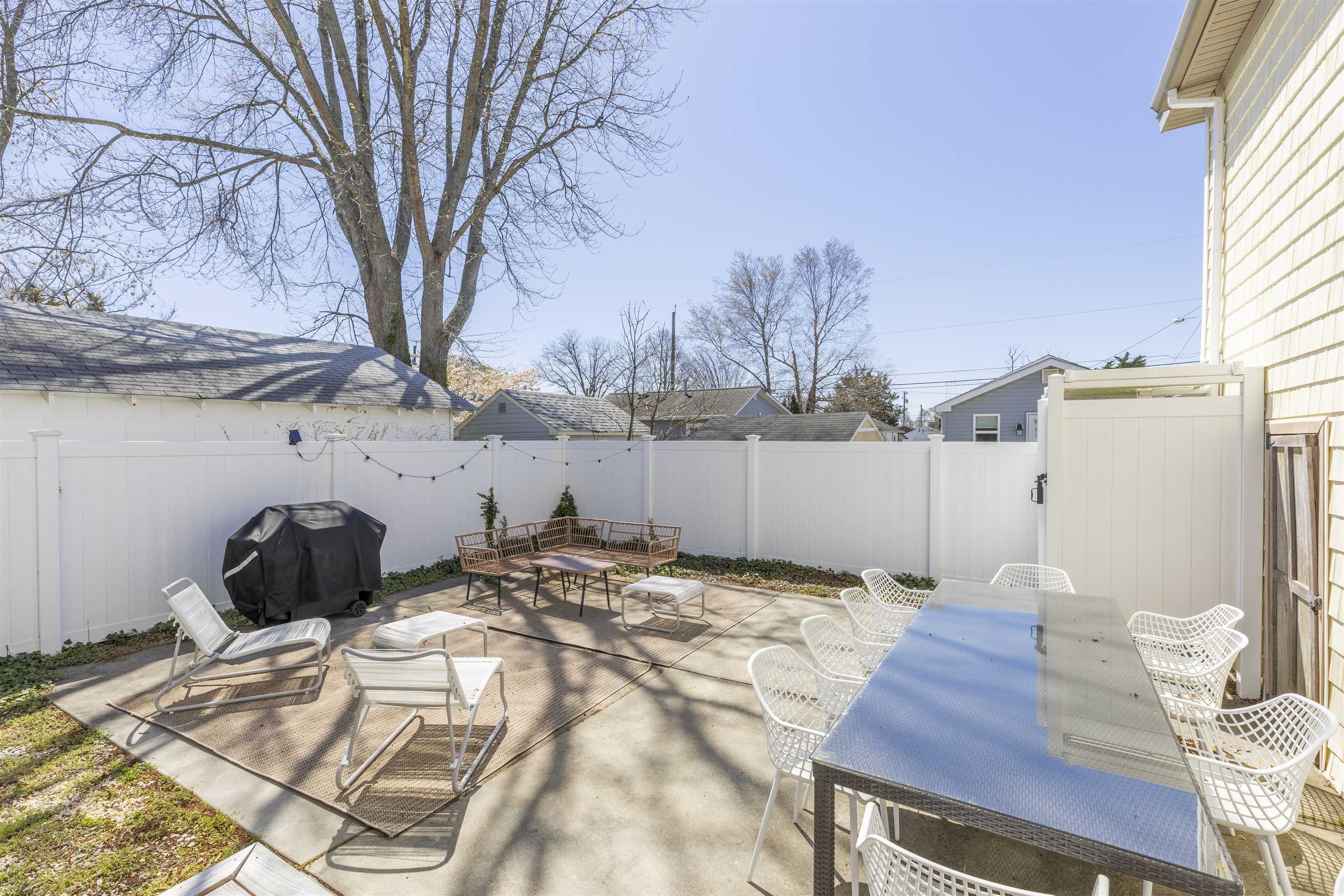 50 Birch Road Villas, NJ 08251 - Photo 19 of 50 a bed sitting in a bedroom next to a window and a chair