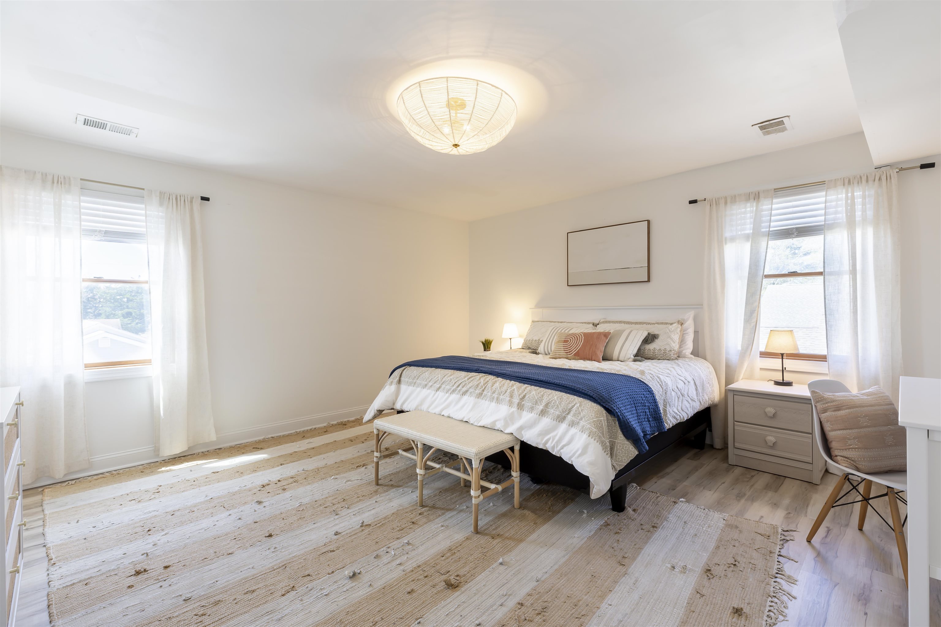 50 Birch Road Villas, NJ 08251 - Photo 21 of 50 a bedroom with a bed a table and chair