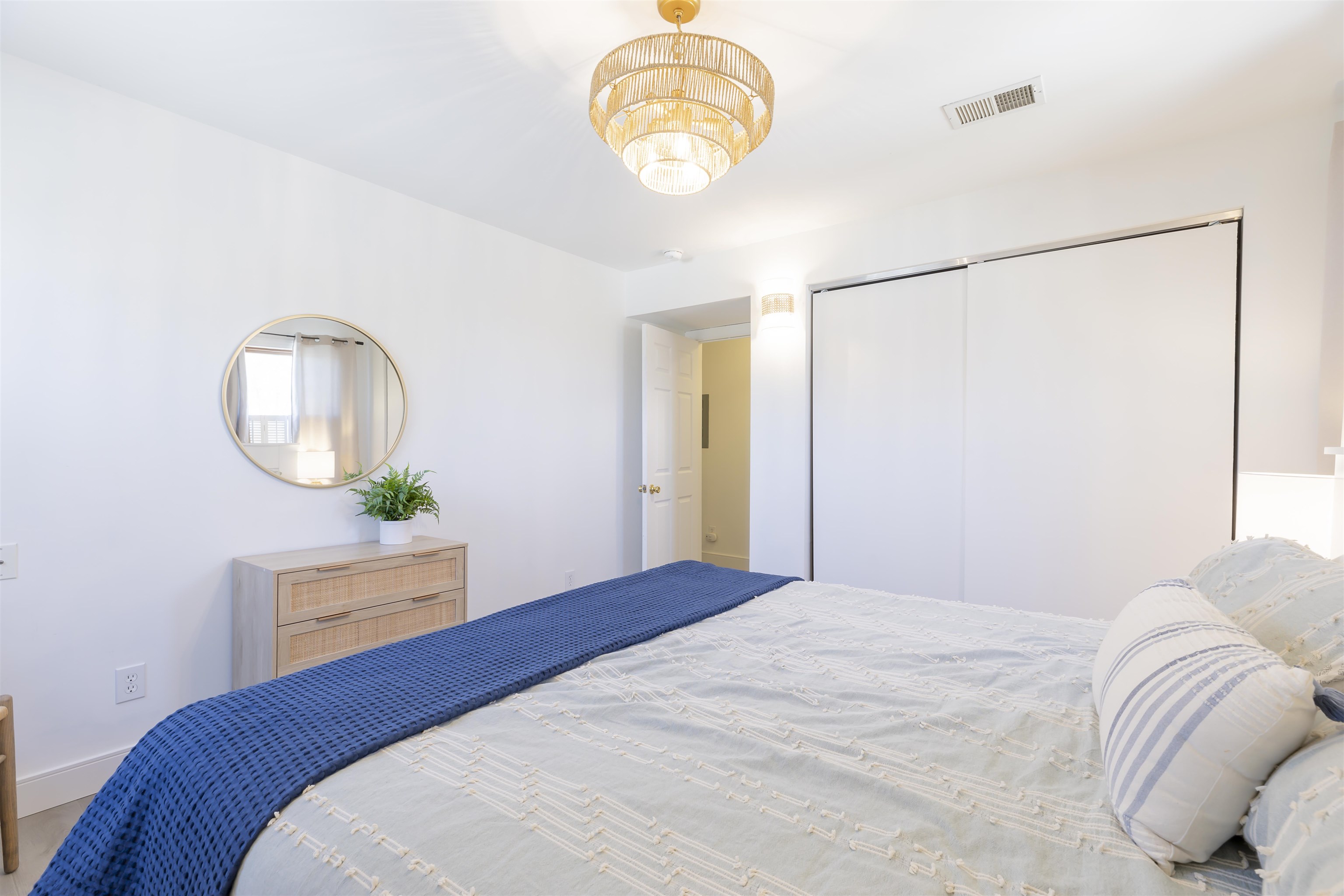 50 Birch Road Villas, NJ 08251 - Photo 26 of 50 a bedroom with a bed and a mirror