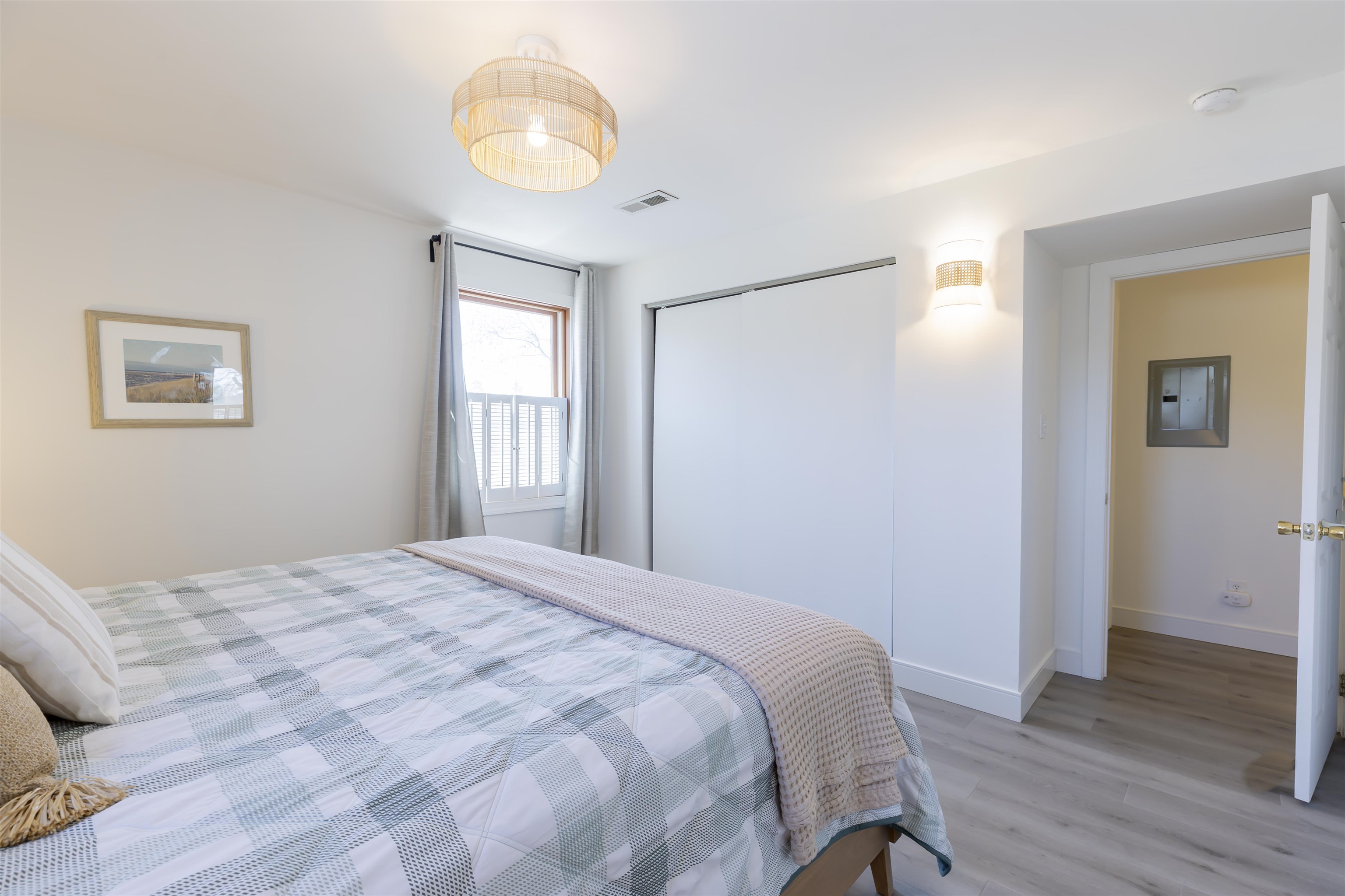 50 Birch Road Villas, NJ 08251 - Photo 28 of 50 a bedroom with a bed and wooden floor
