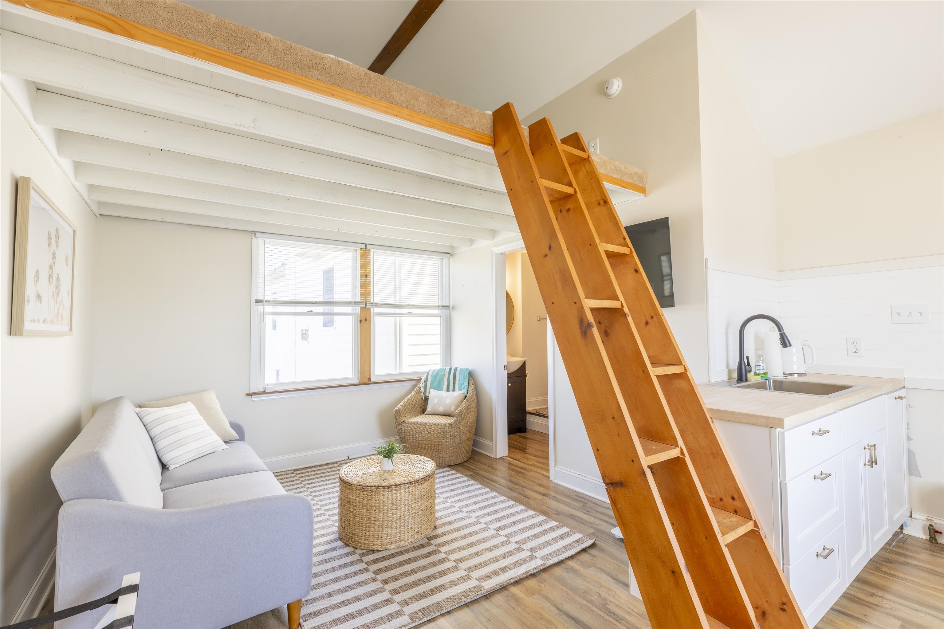 50 Birch Road Villas, NJ 08251 - Photo 43 of 50 a living room with a couch and wooden floor