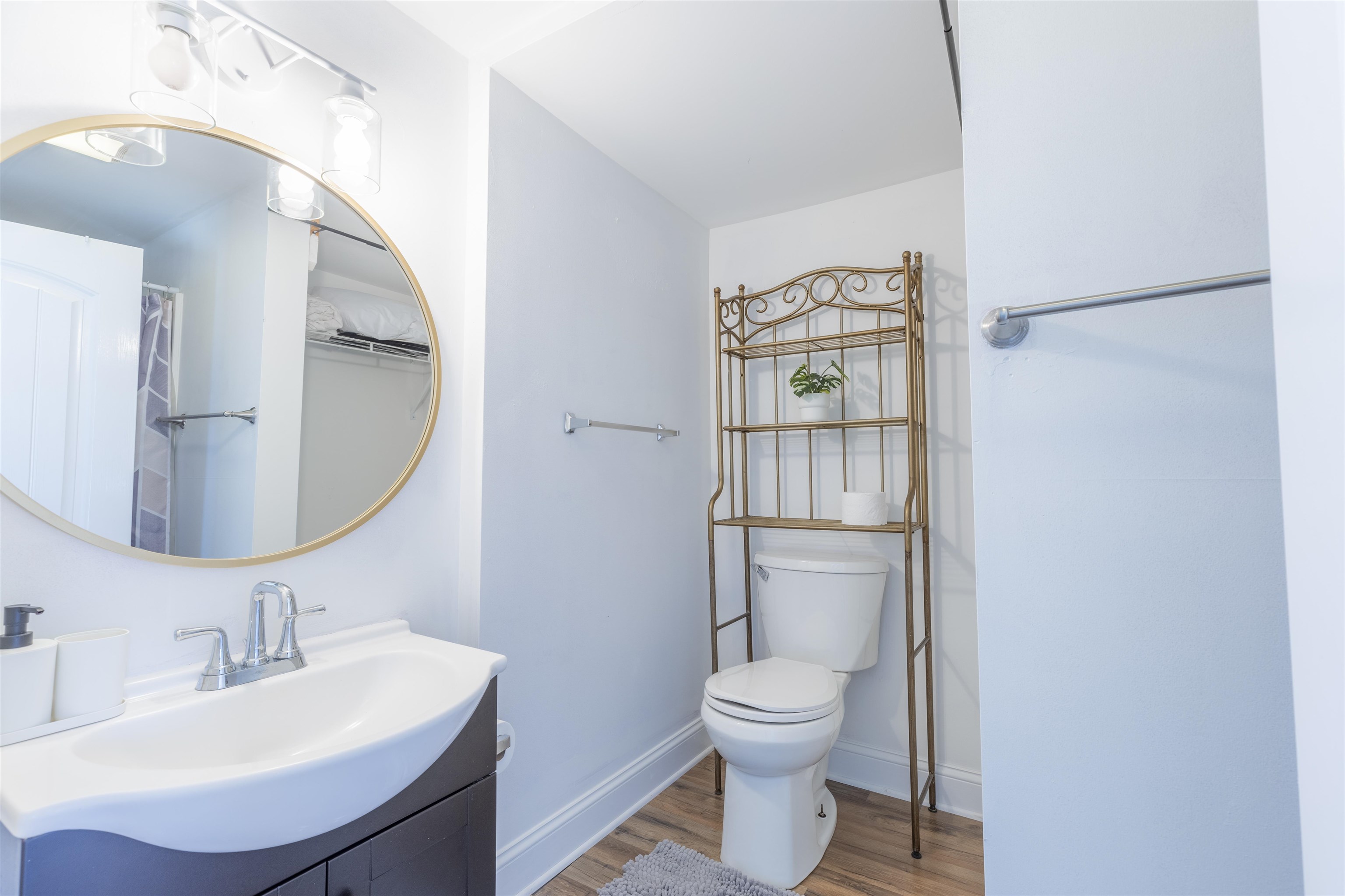50 Birch Road Villas, NJ 08251 - Photo 44 of 50 a bathroom with a toilet sink and mirror