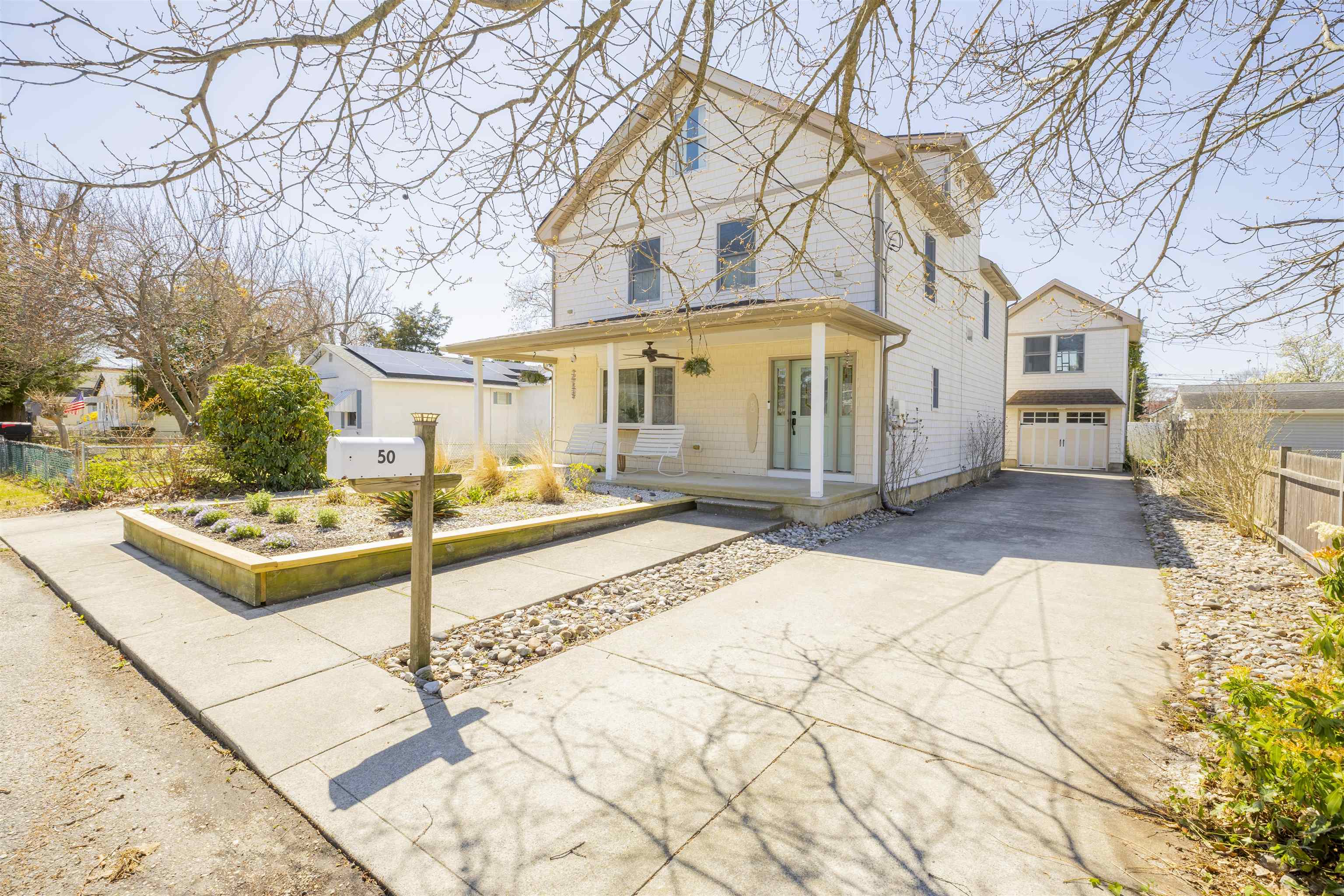 50 Birch Road Villas, NJ 08251 - Photo 46 of 50 a front view of a house with a yard