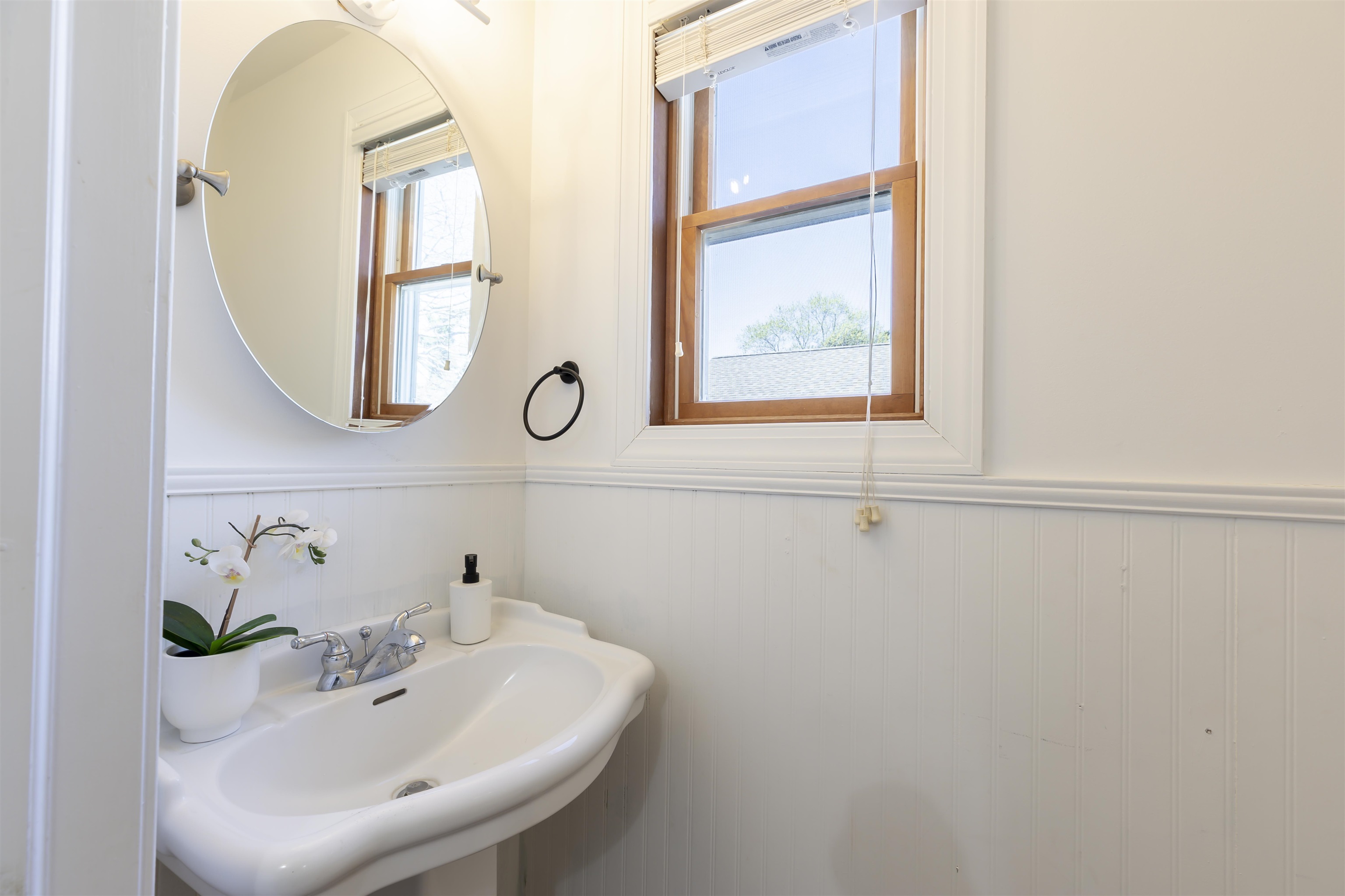 50 Birch Road Villas, NJ 08251 - Photo 7 of 50 a bathroom with a sink and a mirror