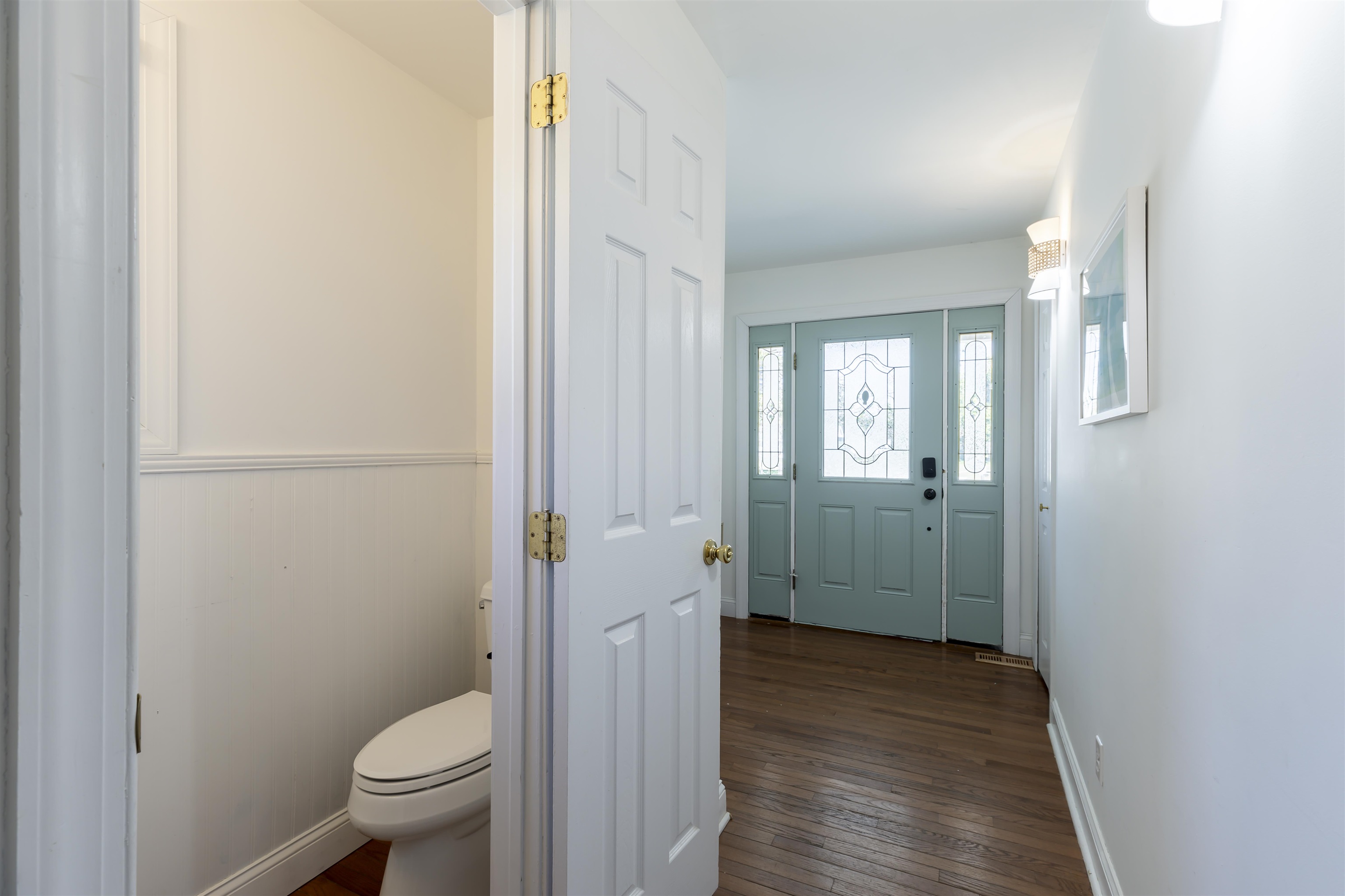 50 Birch Road Villas, NJ 08251 - Photo 8 of 50 a bathroom with a granite countertop toilet a sink and mirror