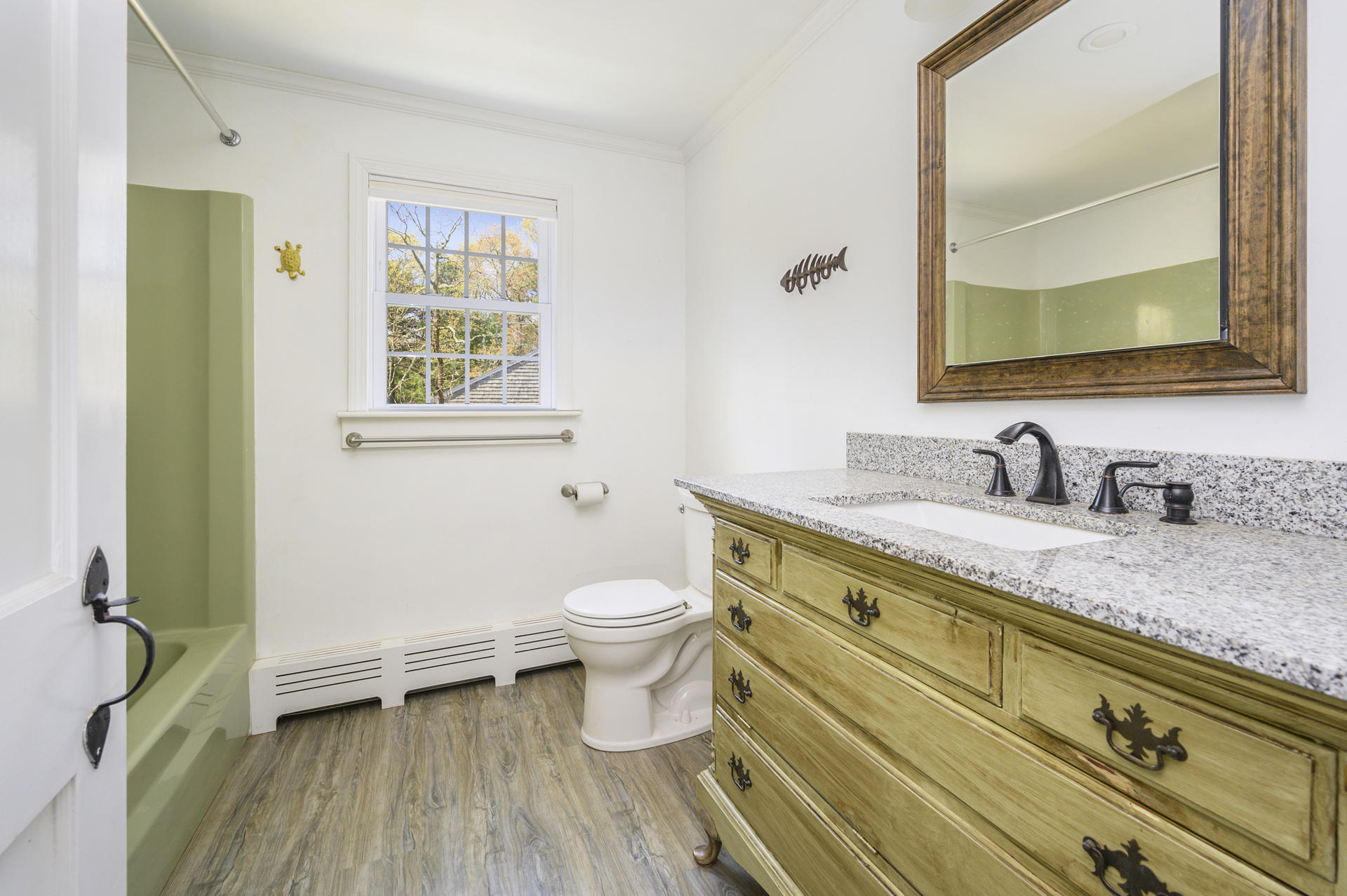 129 Richardson Road Centerville, MA 02632 - Photo 15 of 24 a bathroom with a granite countertop toilet sink and mirror