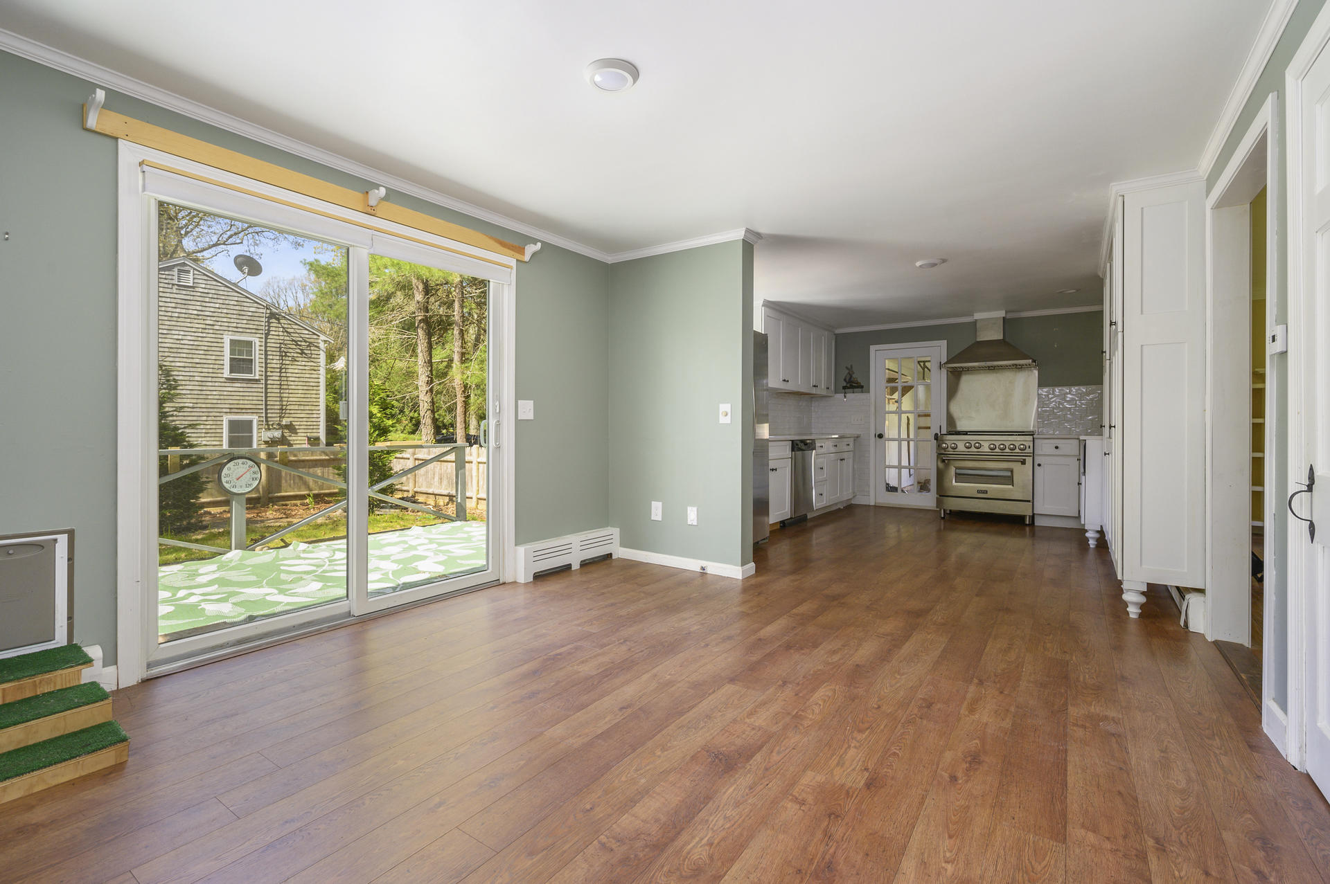 129 Richardson Road Centerville, MA 02632 - Photo 6 of 24 wooden floor in an empty room with a window