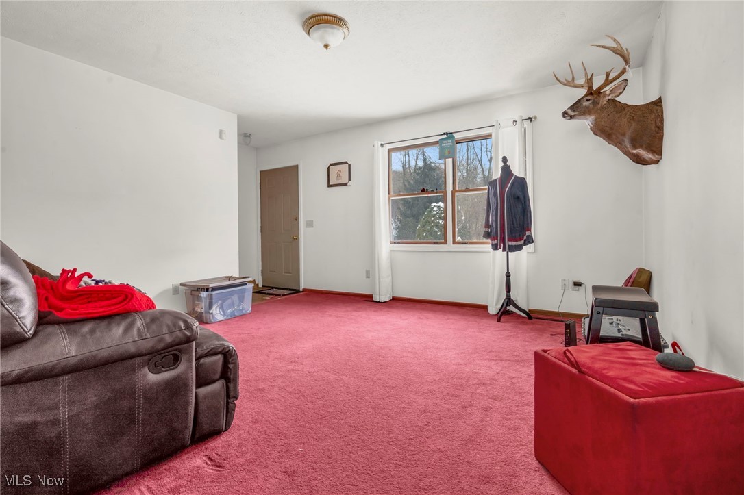 1648 Cassell Road Butler, OH 44822 - Photo 9 of 36 View of carpeted living room