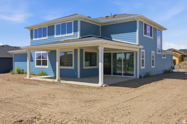 1315 West 3200 South, Unit 17 Perry, UT 84302 - Photo 55 of 58 Contemporary two-story residence featuring blue siding and white trim